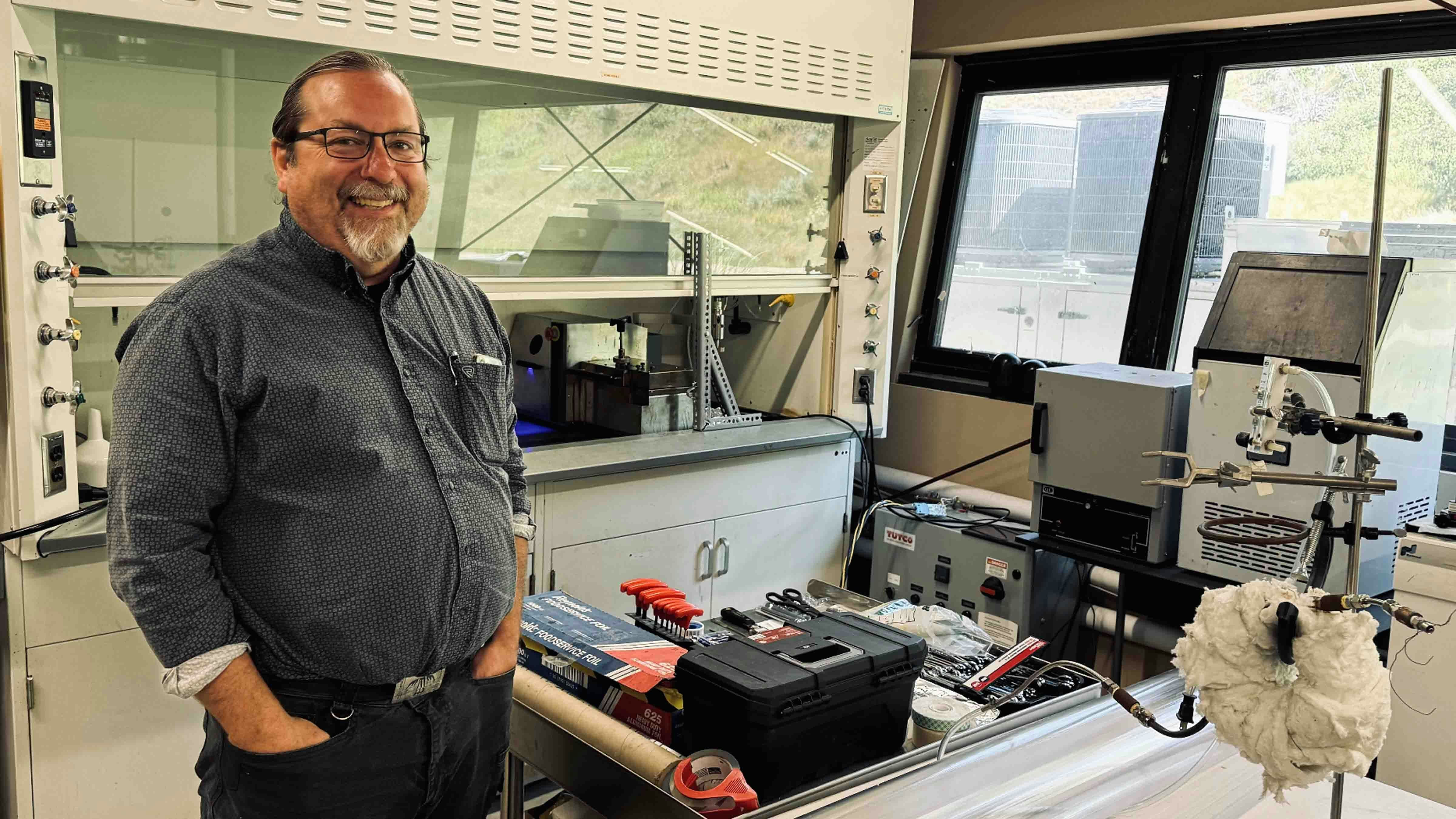 Charles Hill, who runs Ramaco Resources’ carbon fiber research, stands in the laboratory where he works at the company’s Innovation of Carbon Advancement of Materials.