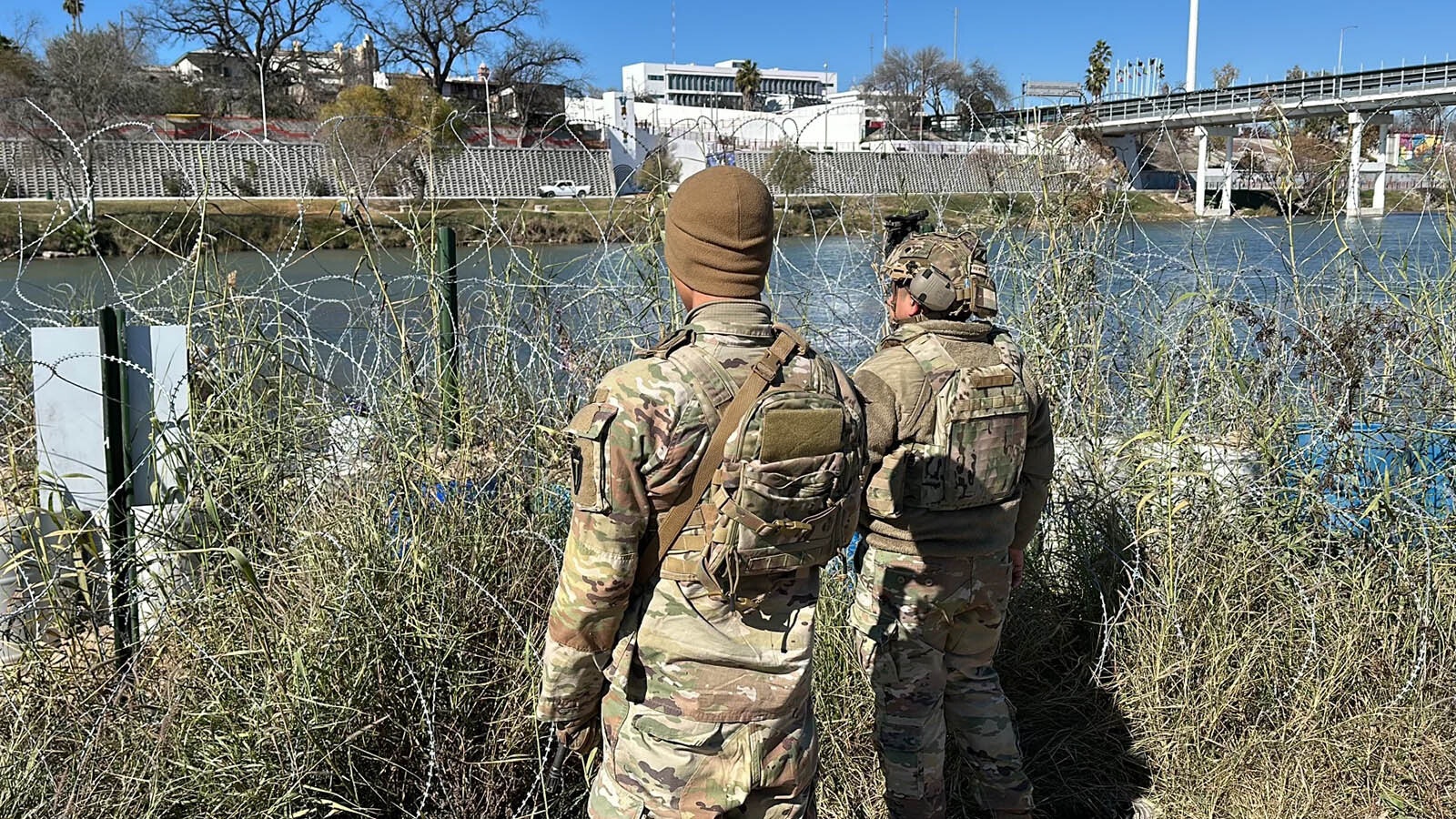 Members of the Texas National Guard watch over a section of the U.S. border with Mexico.