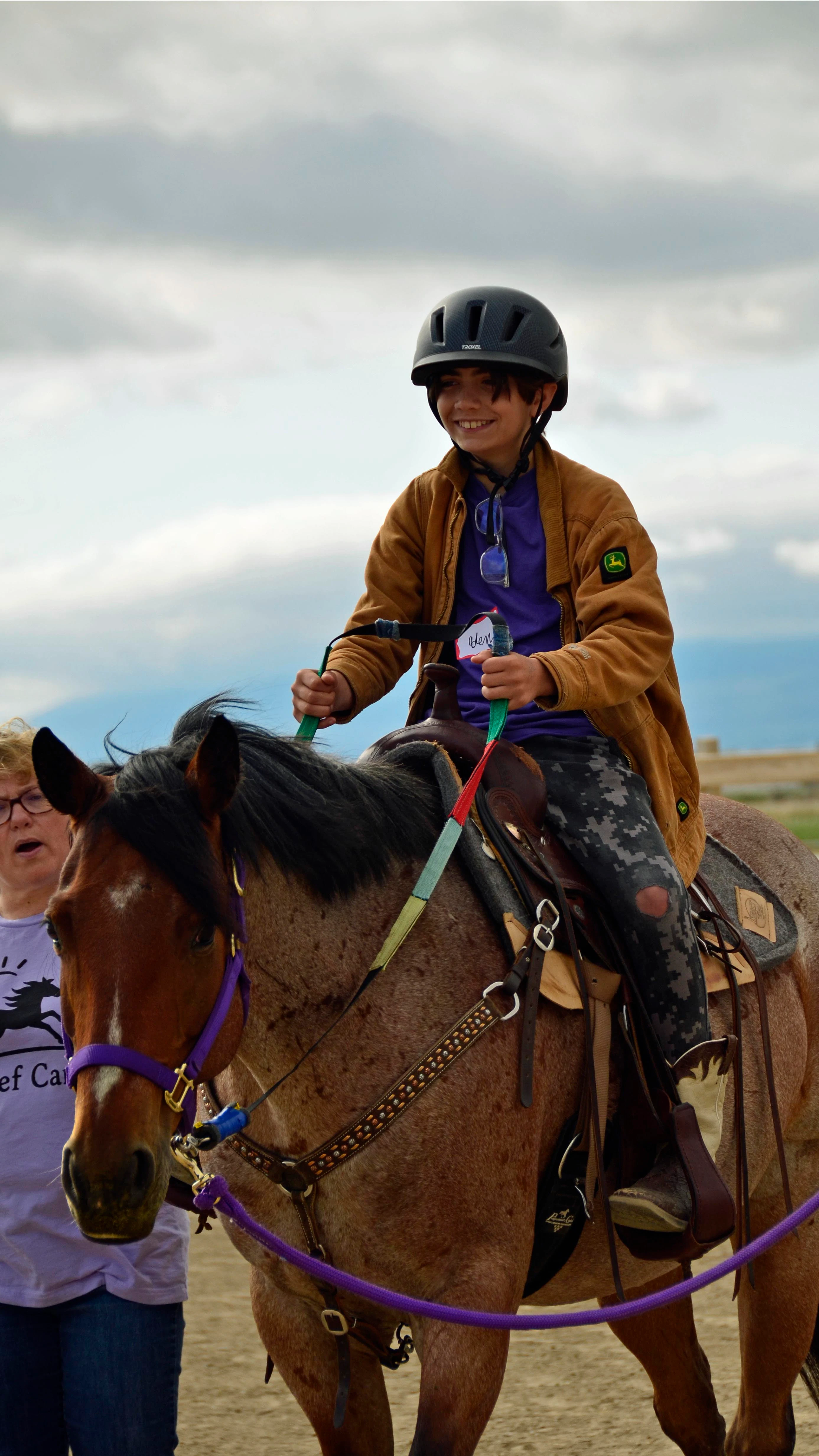 Aden Waller rides through the arena at Ropes & Roses