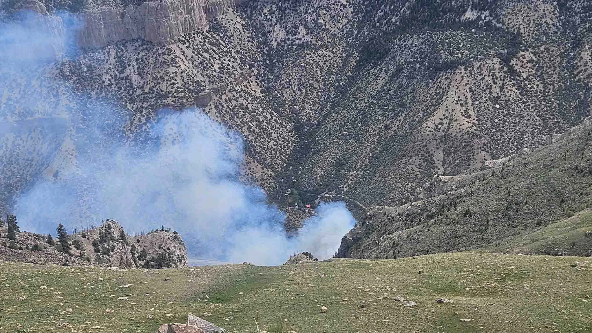 Wind River Canyon Fire from the Arapaho Ranch. Fire has not yet reached the rim.