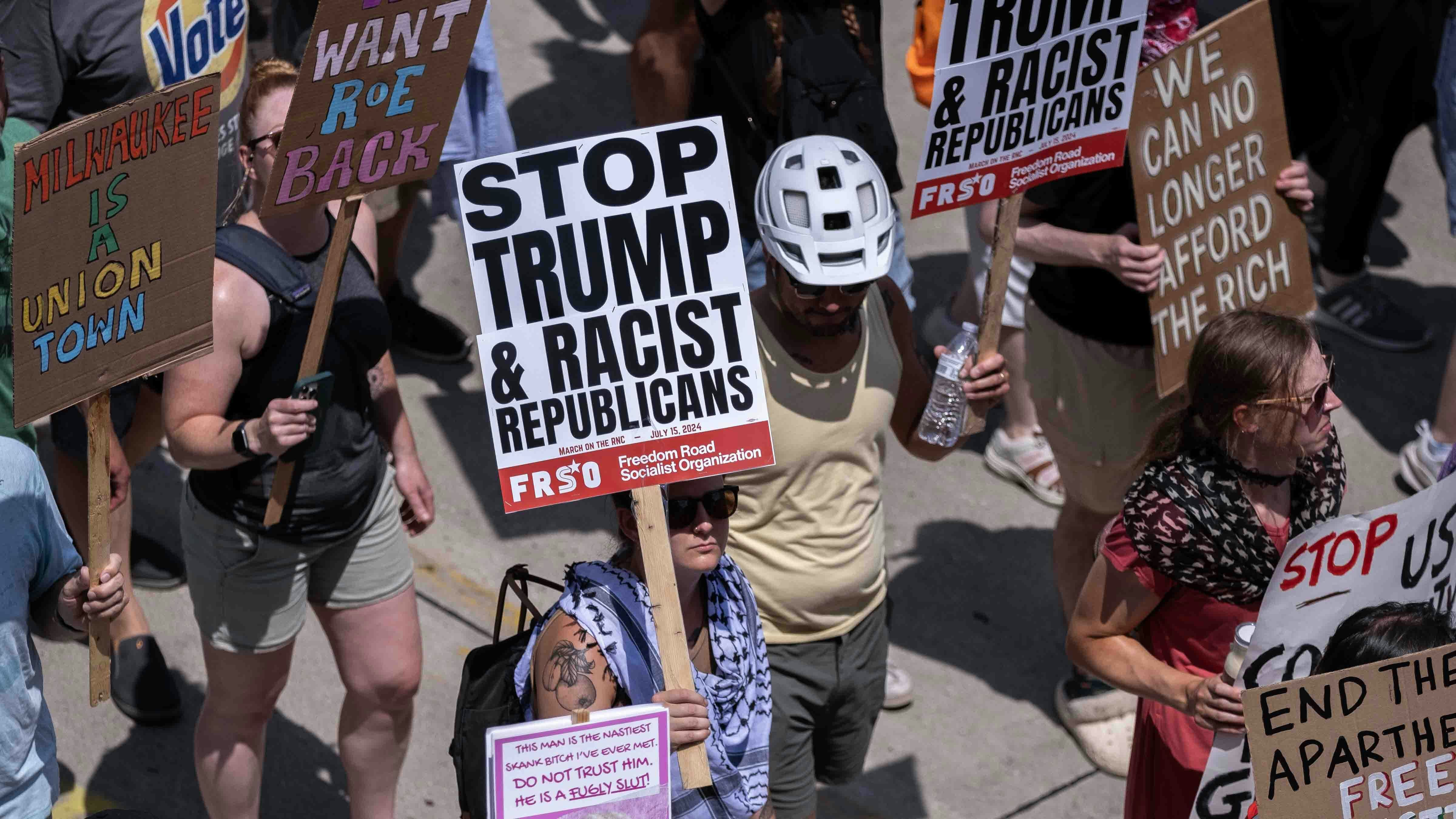 Pro-Palestine and other protesters march through the streets of downtown Milwaukee as the Republican National Convention begins on July 15, 2024 in Milwaukee, Wisconsin.