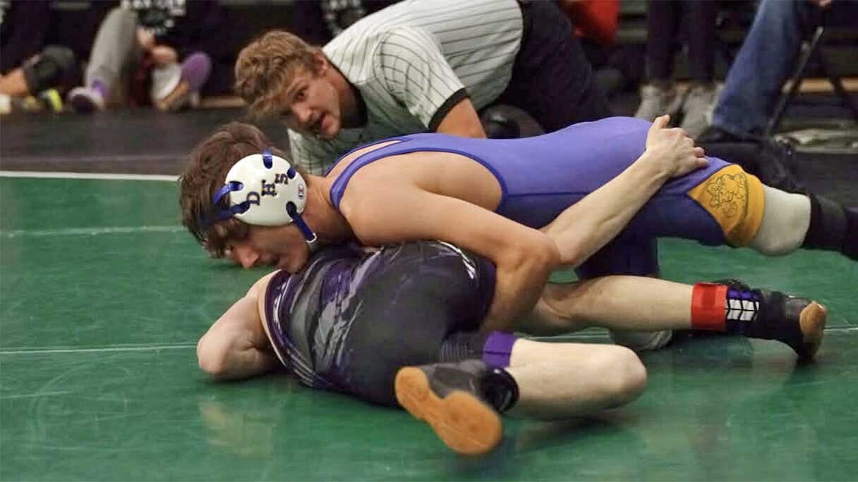 "Dubois High School senior Sammie Cyrus competing in a 106-pound division a wrestling matching."