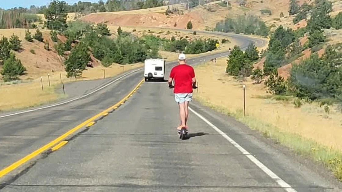 Cheyenne driver Cody Campbell took photos of people riding their electric scooters on a two-lane highway near Laramie.