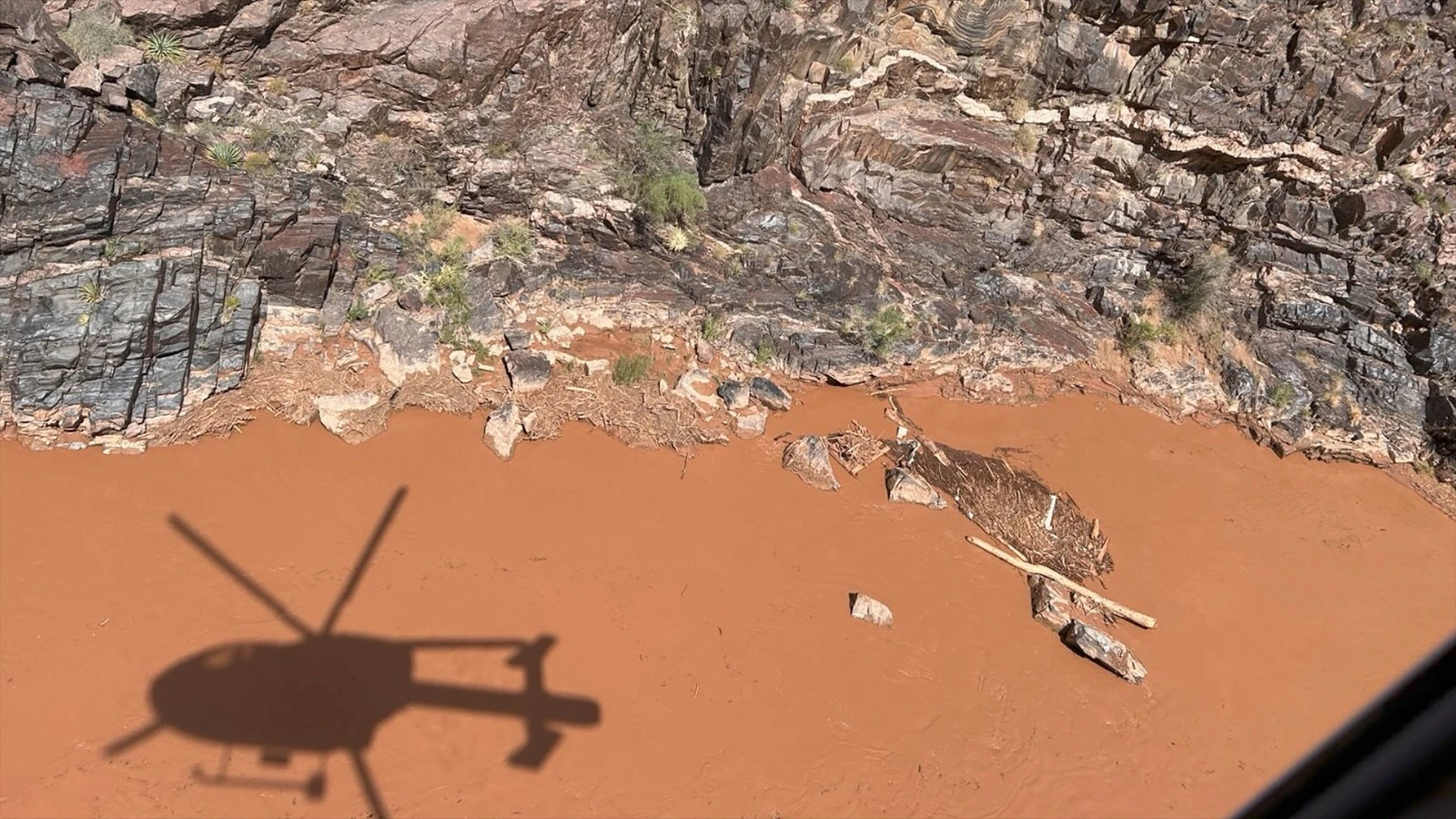 Helicopter 368 searches the Colorado River for Timothy Smith, the Wyoming hiker missing after a flash flood Aug. 29.