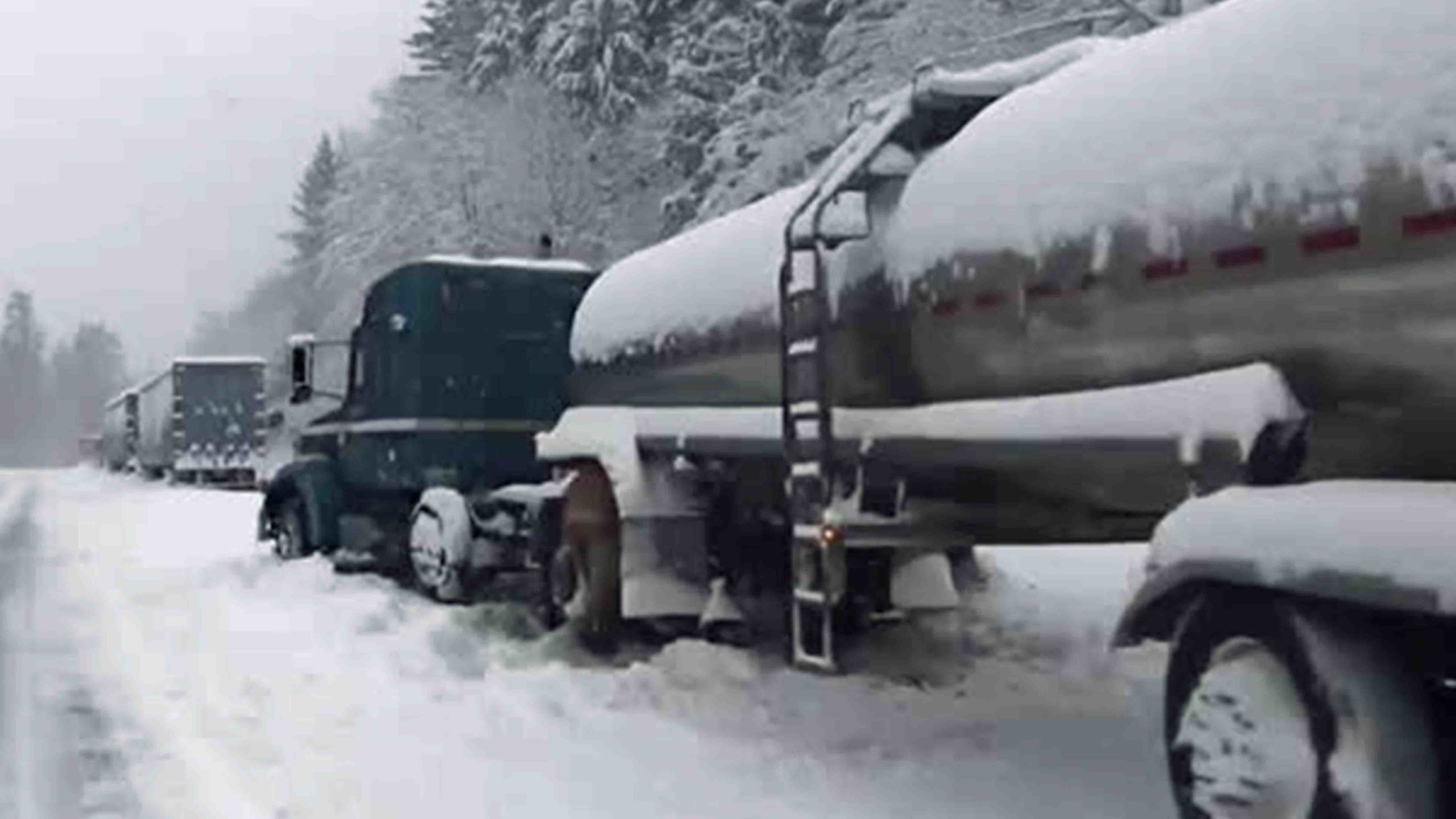 Semi stuck in snow scaled