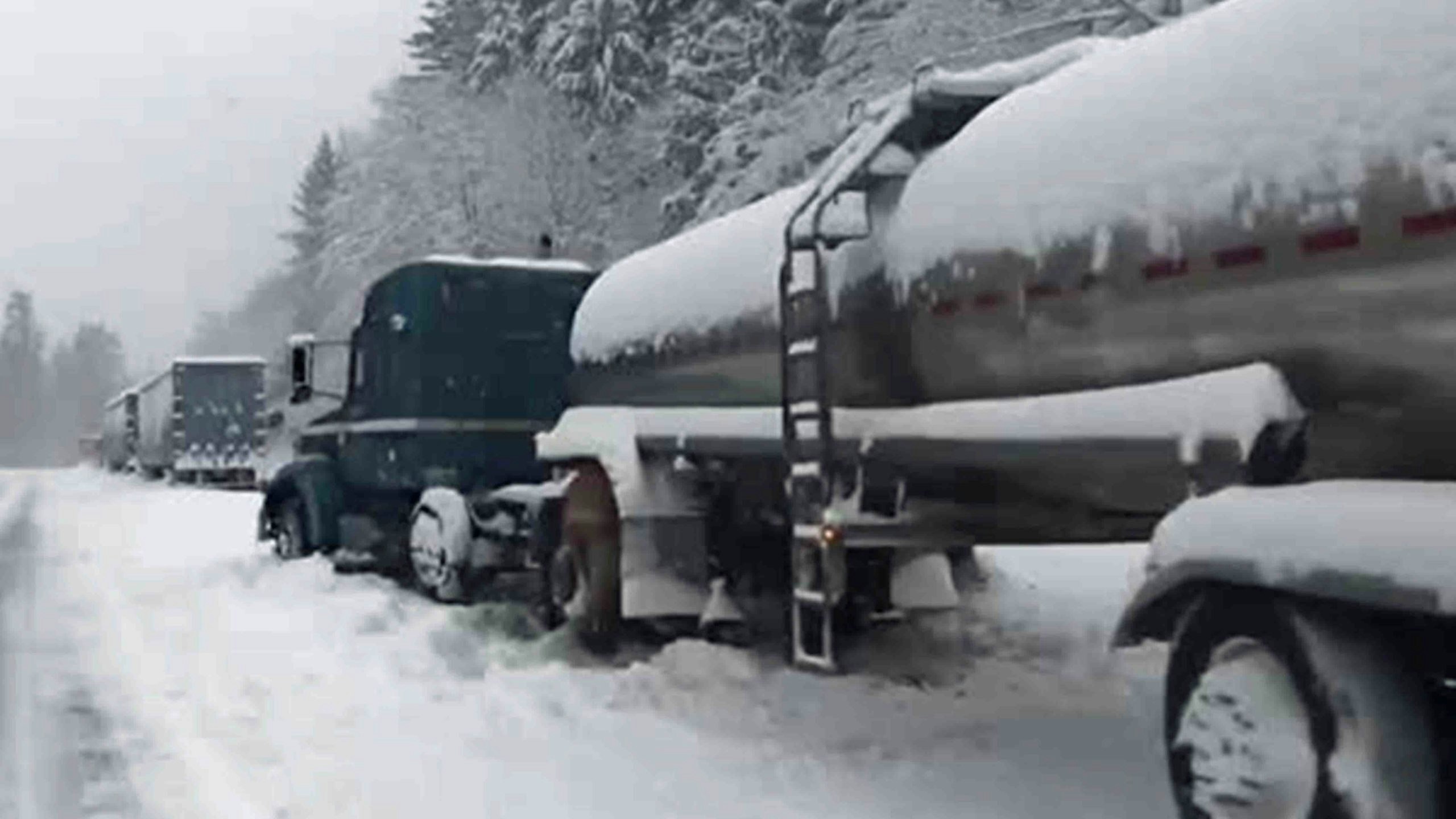 Semi stuck in snow scaled
