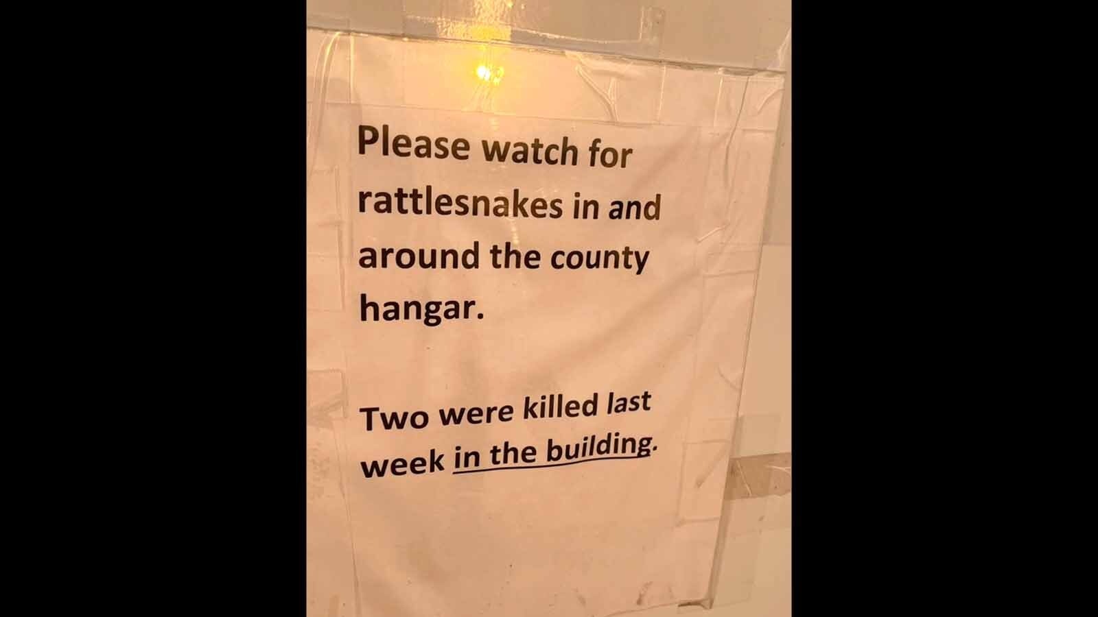 A sign at the South Big Horn County Airport in Greybull warns of the presence of rattlesnakes, which are common there.