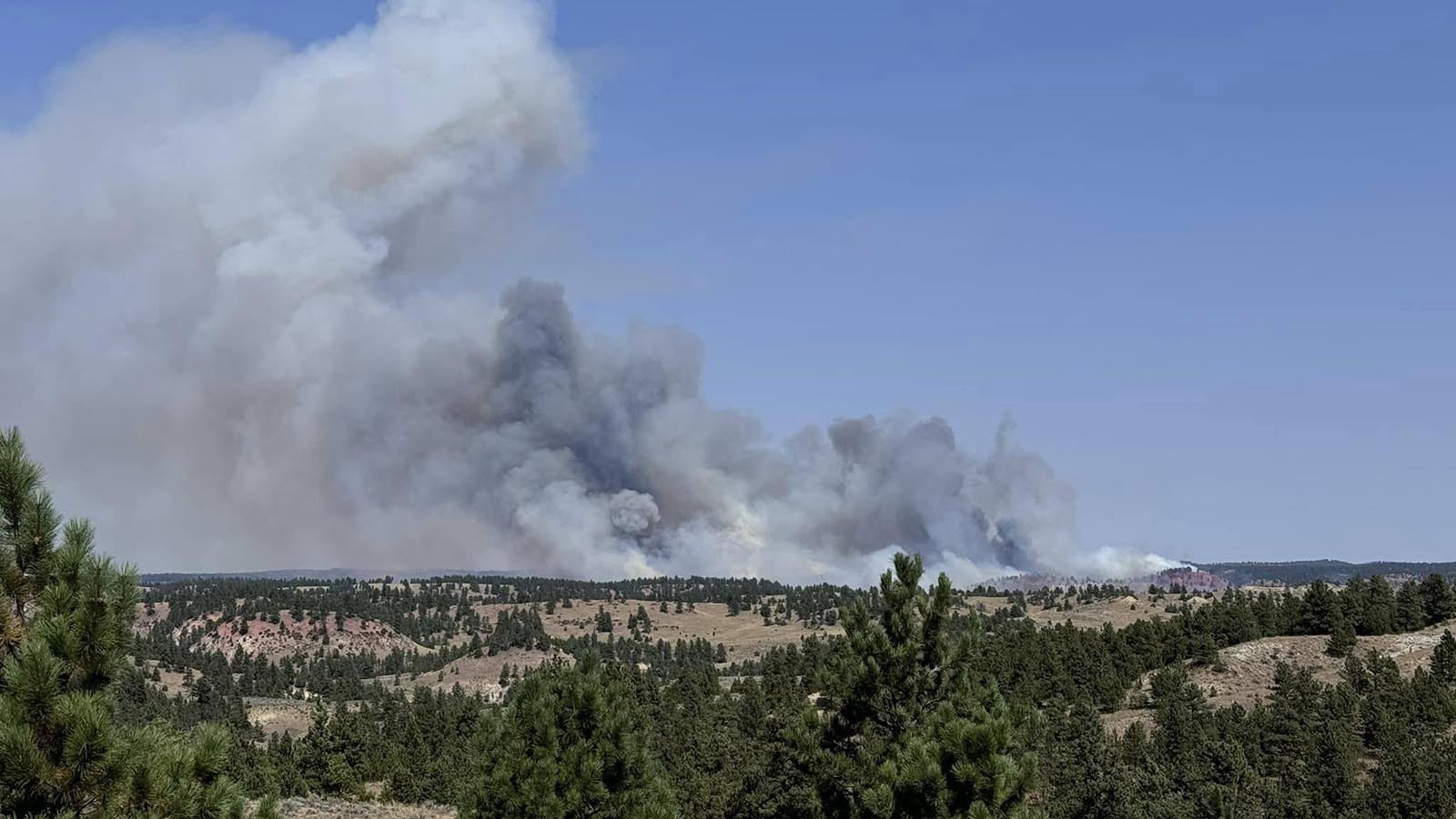 Smoke rises from the Silver Spoon Fire in northern Campell County, Wyoming, near the Montana border.