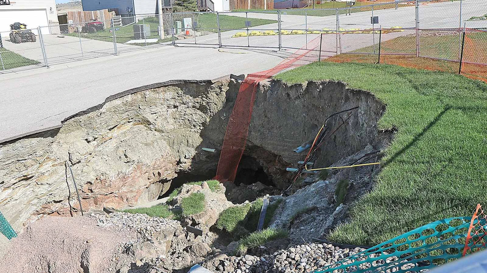 Six years after a huge sinkhole opened up in a subdivision near Black Hawk, South Dakota, victims still waiting for relief. The disaster highlights the difference between Wyoming’s abandoned mine safeguards and South Dakota’s limited protections.