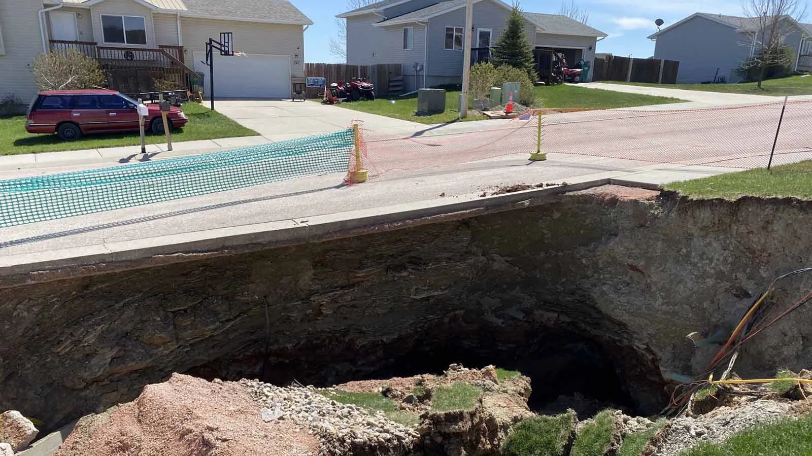 Six years after a huge sinkhole opened up in a subdivision near Black Hawk, South Dakota, victims still waiting for relief. The disaster highlights the difference between Wyoming’s abandoned mine safeguards and South Dakota’s limited protections.