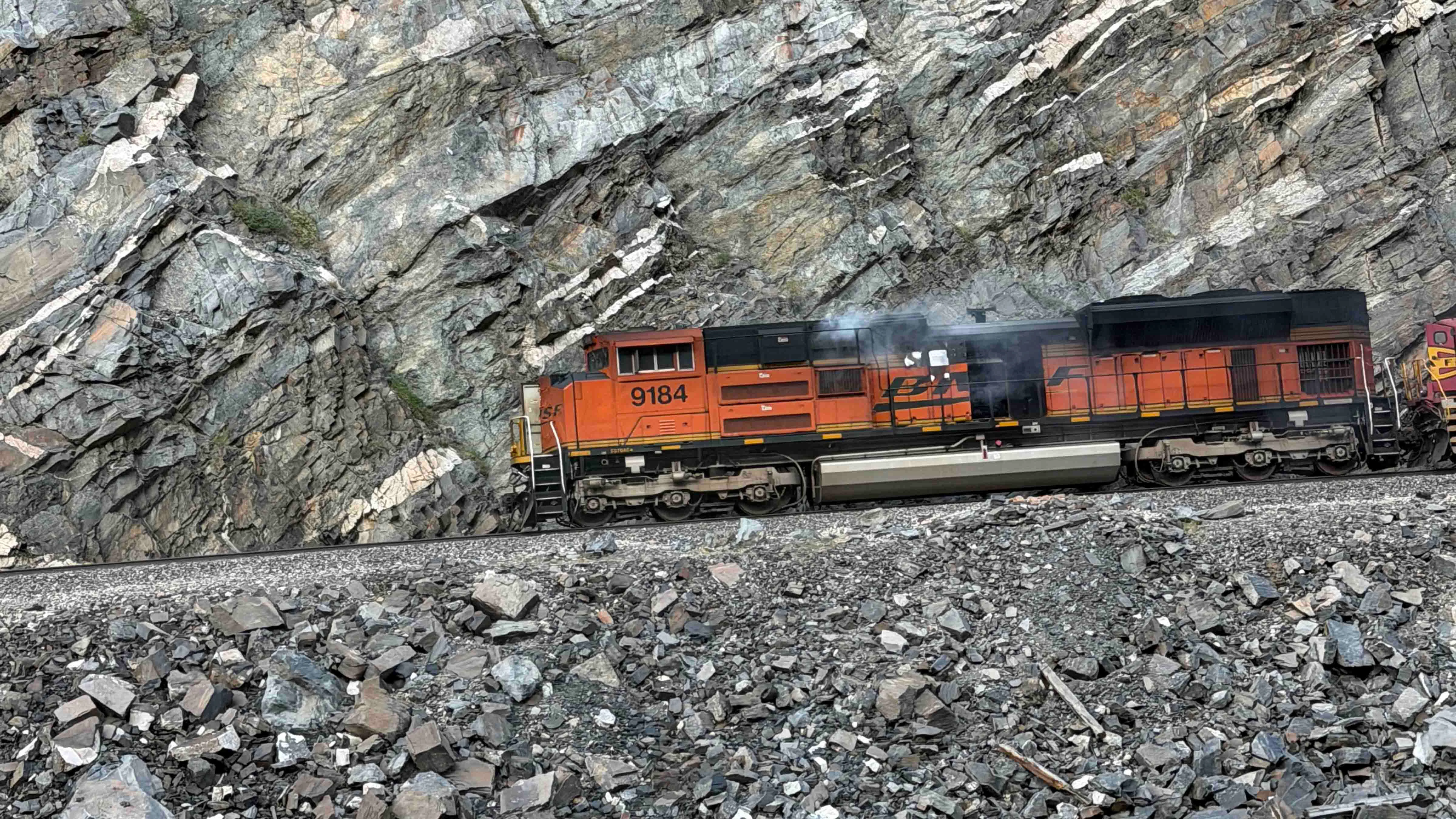 Nicole Weyer told Cowboy State Daily she noticed this smoking locomotive engine at 8:30 a.m. when she and her husband were traveling to Shoshoni.