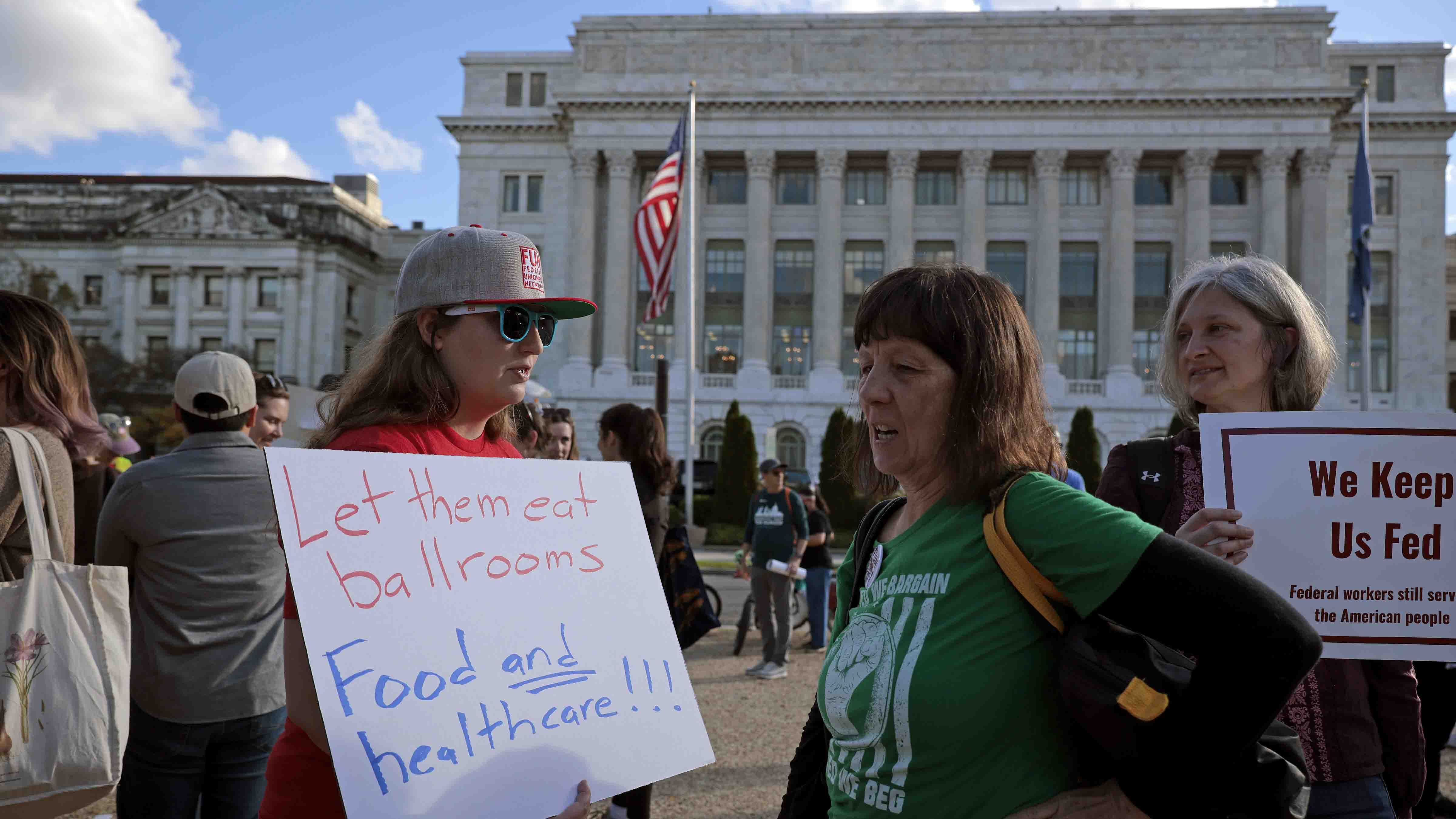 Members of the Federal Unionists Network and other unions and activist groups rally in front of the U.S. Department of Agriculture on the National Mall during the 30th day of the federal government shutdown, October 30, 2025 in Washington, DC.