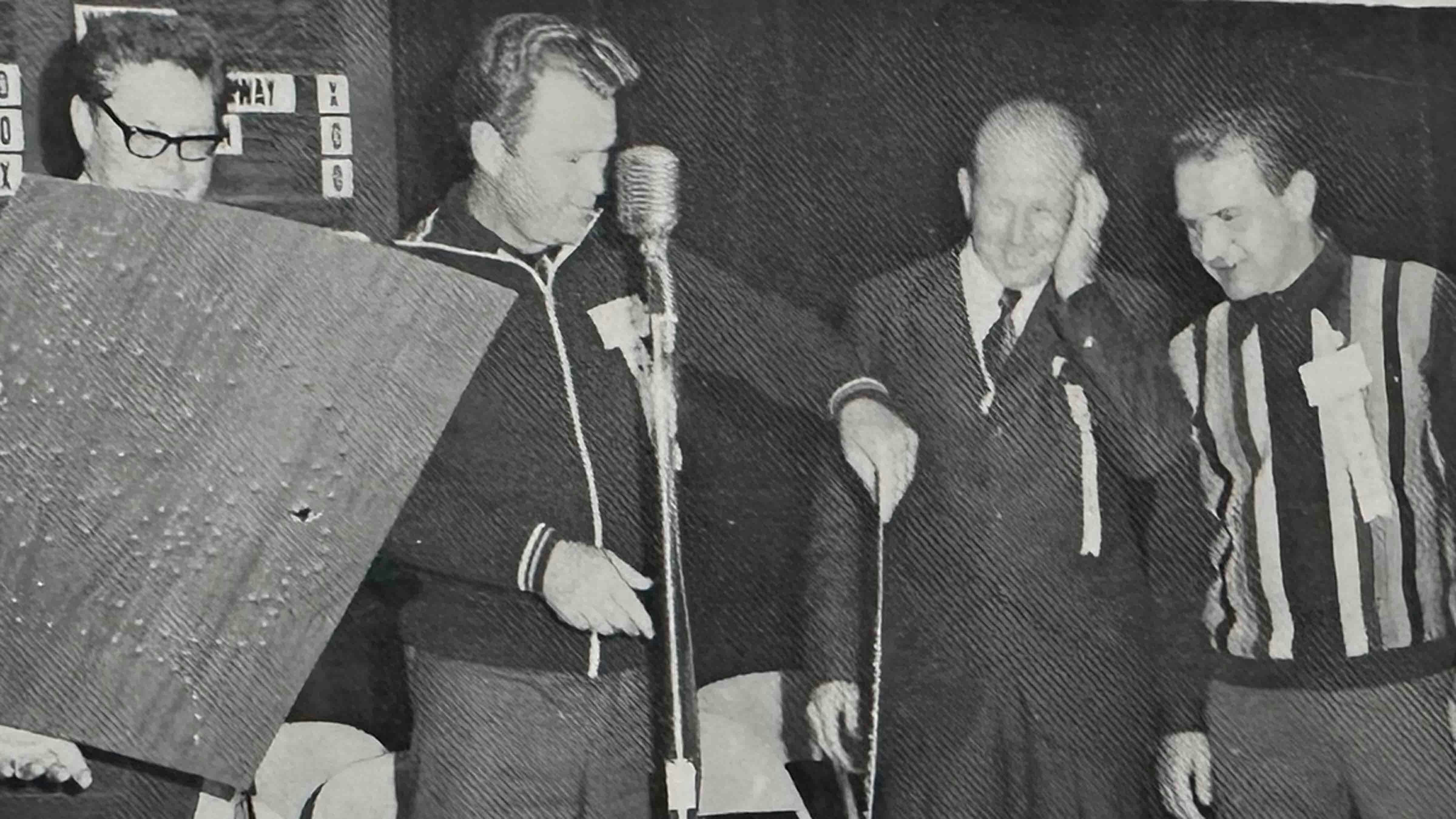 The three Russian Cosmonauts on stage at the One Shot Banquet with club president Harold Meier.