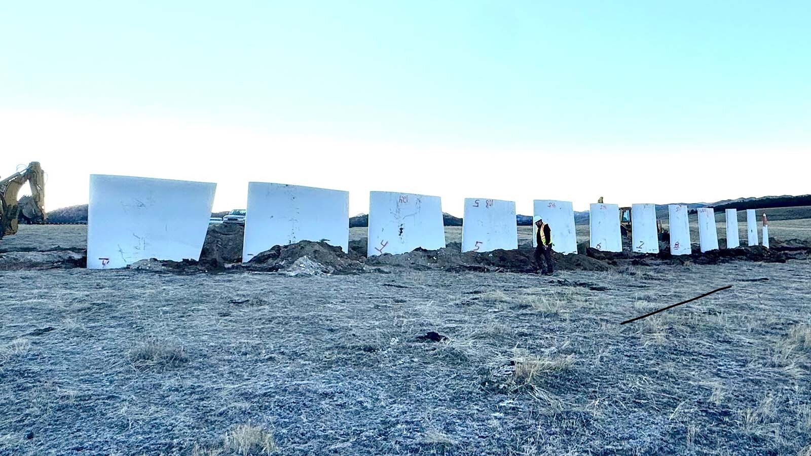 Parts of a wind turbine blade had been installed off of Esterbrook Road south of Douglas as part of a sculpture and snow fence project by Casper artist Chris Navarro is calling “The Wall of Renewal.”