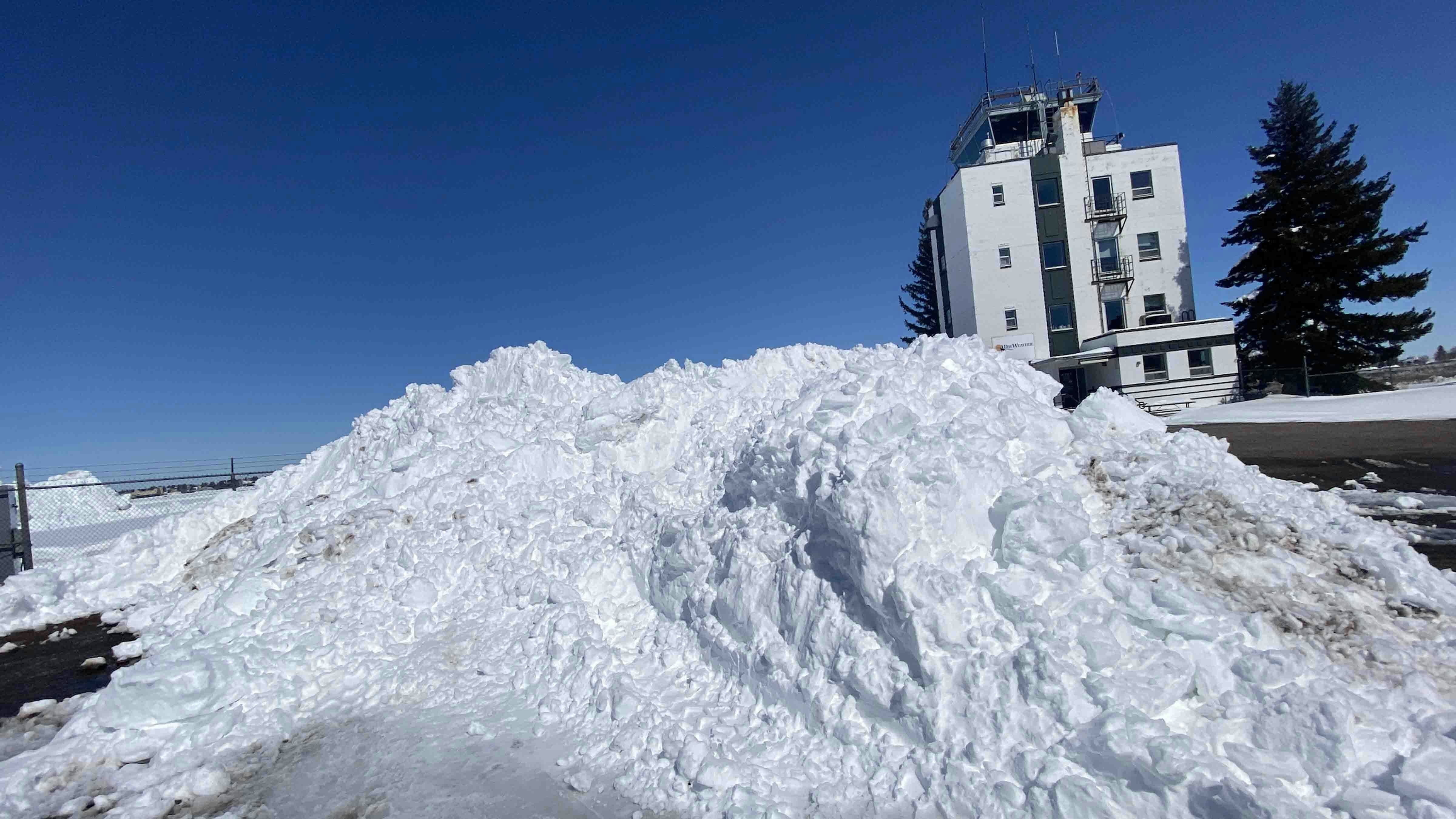 On March 14, 2021, the city of Cheyenne received over 30+inches of snow overnight. One of the many massive snowdrifts outside of Don Day's headquarters