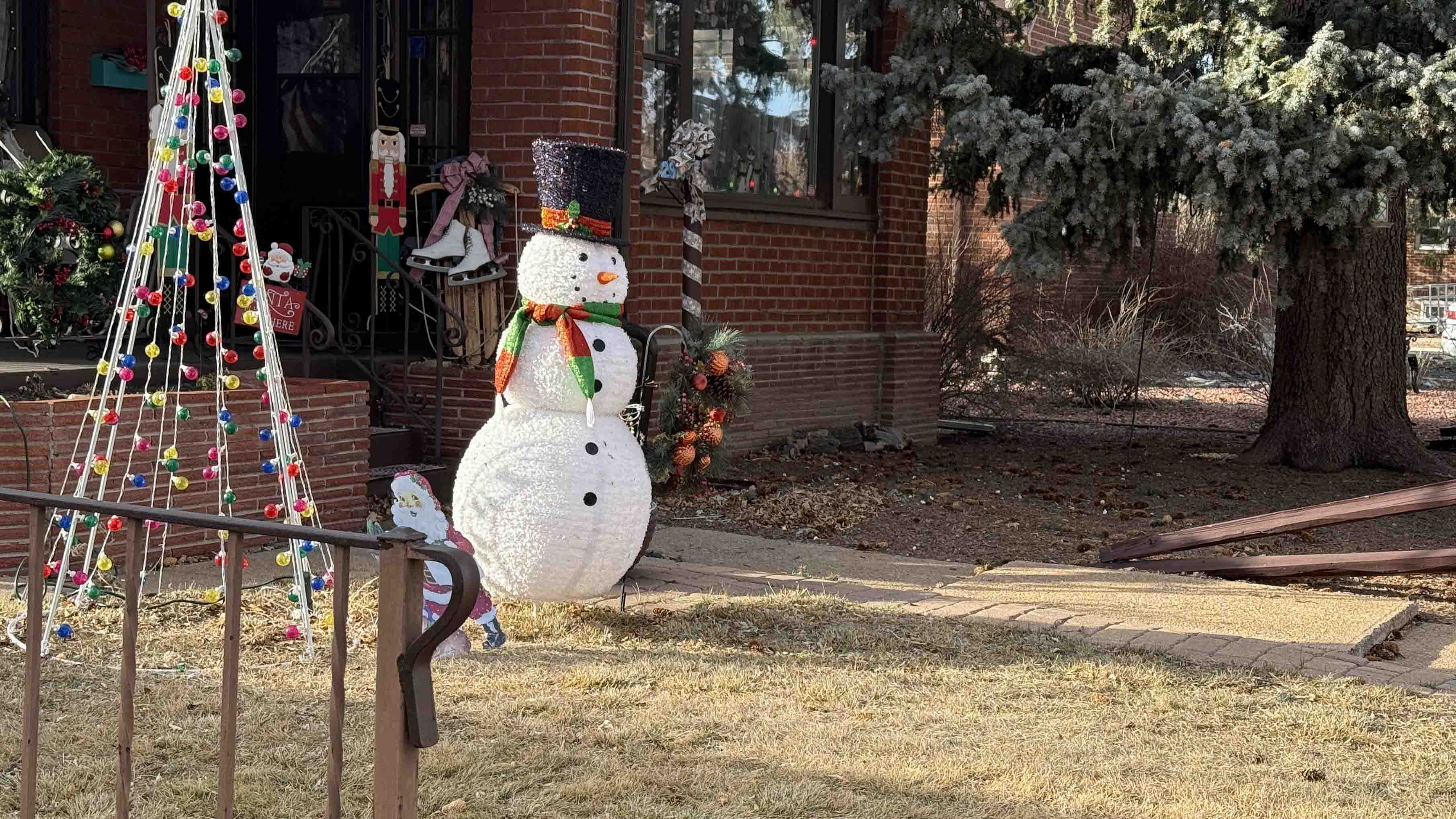 Styrofoam snowman on brown lawn in Cheyenne on Friday, December 26, 2025