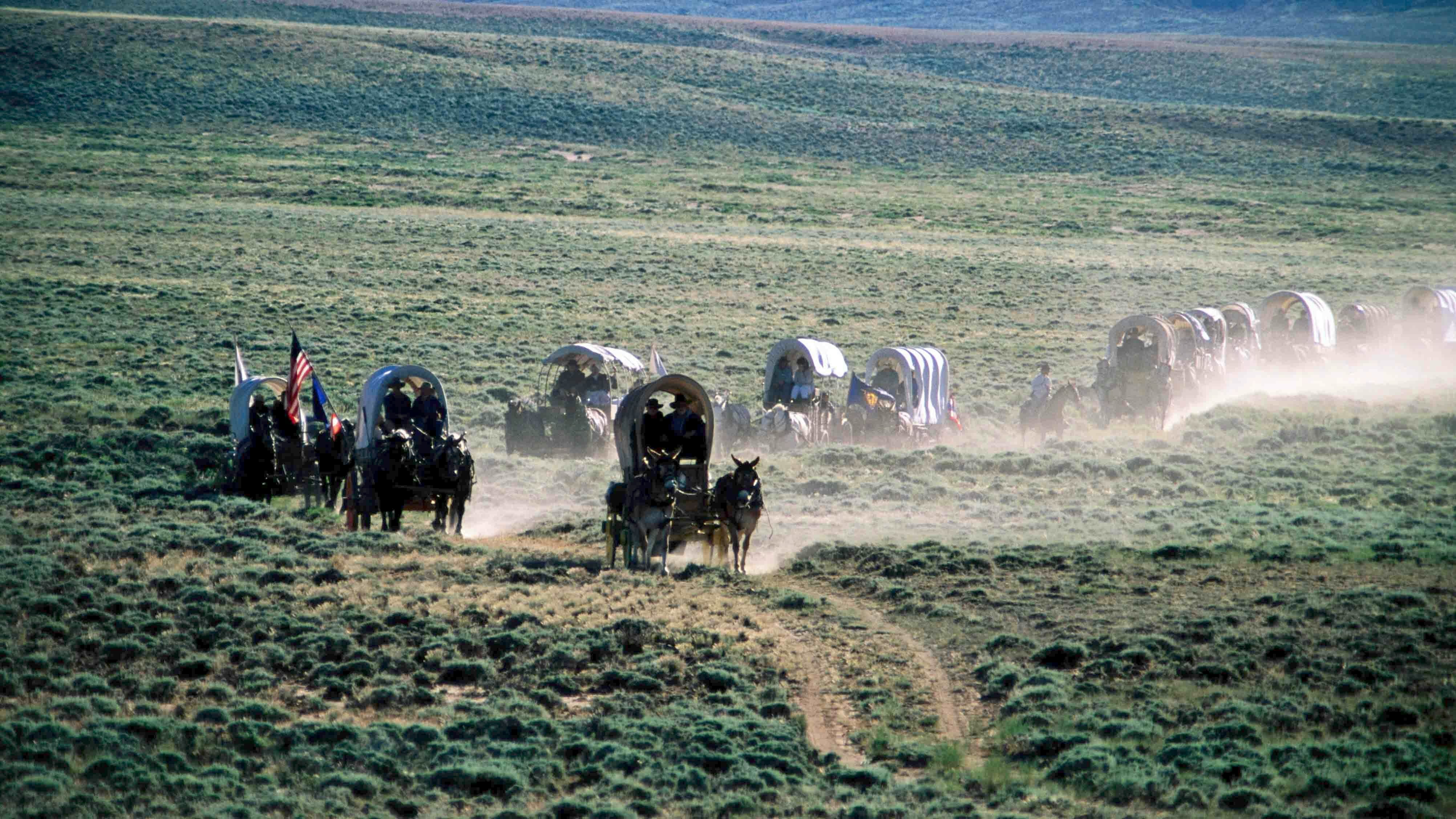 Dusty horse carriage trek, Mormon Pioneer Wagon Train to Utah, near South Pass, Wyoming