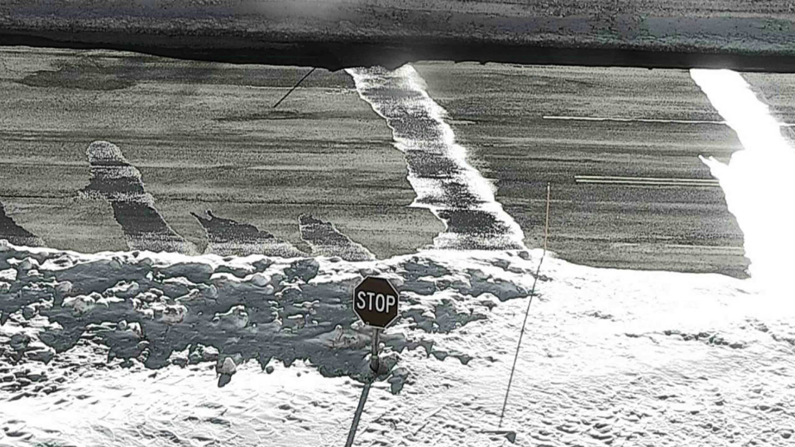 Stop sign snow 3 22 22 scaled
