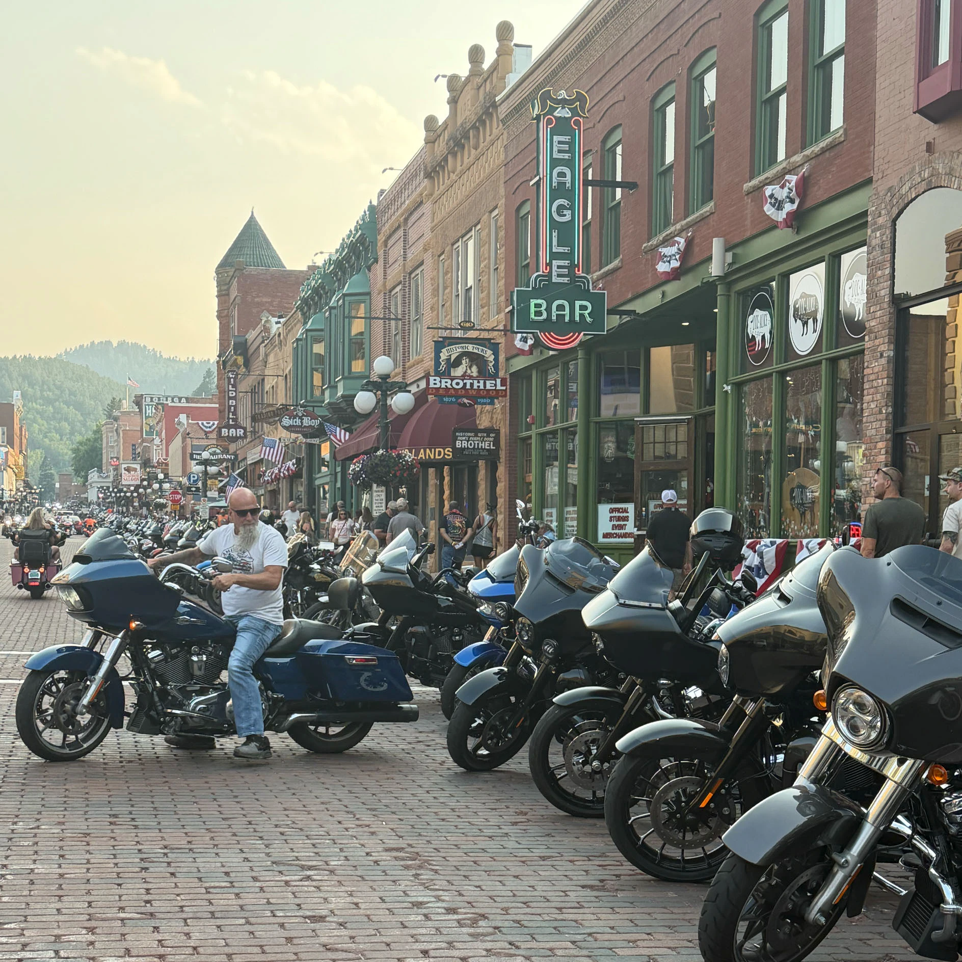 Motorcycles and rallygoers pack the streets in Deadwood as bikers pour into the Black Hills for the Sturgis Motorcycle Rally.