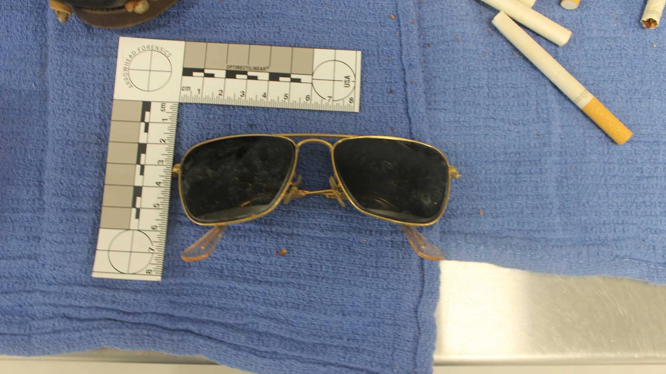 Prescription sunglasses were among the items found on the bank of the Greybull River near where an unidentified young man's body was discovered in 1973.