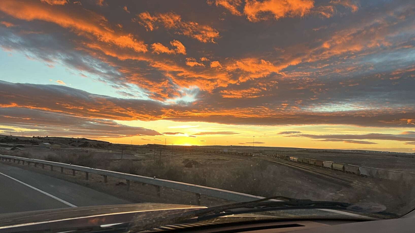 "Photo taken looking east from US 26 just outside of Guernsey. I love that we have such beautiful sunrises. So fortunate to see these regularly."