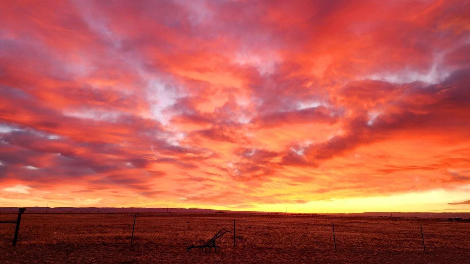 "I don't know if it was the sunrise or the wind that took my breath away!" Near Harmony, WY