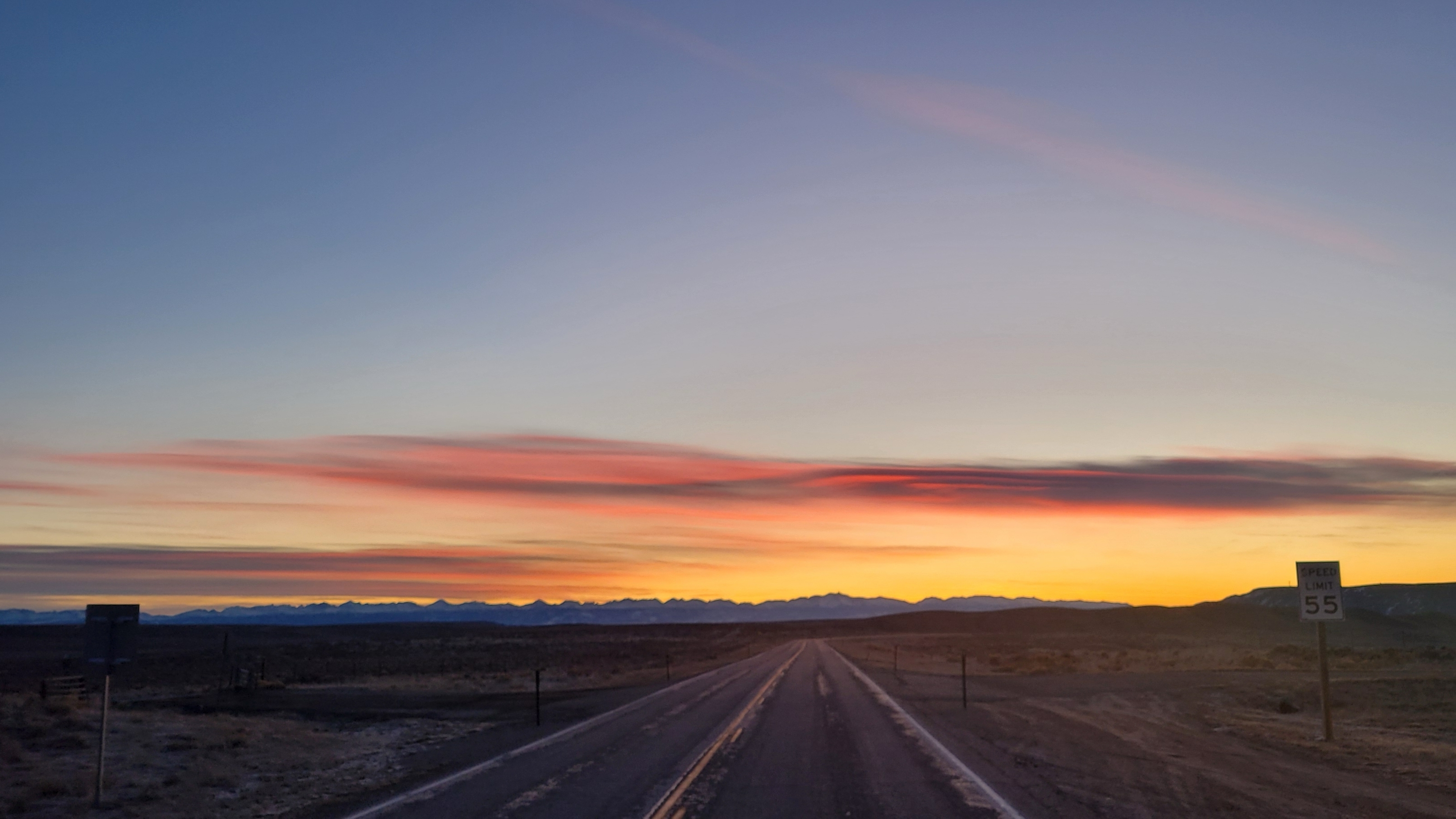 "Sunrise from middle of road. Highway 351, Big Piney."