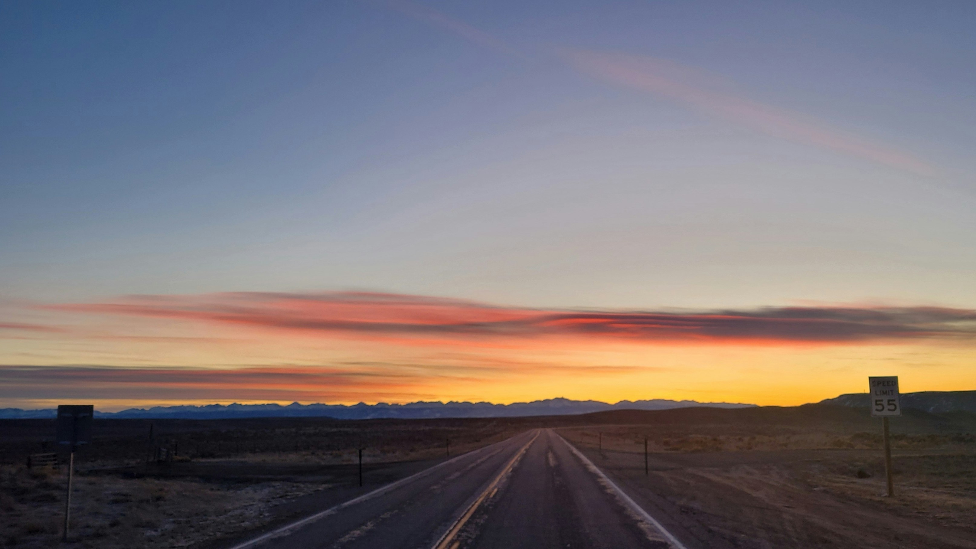 "Sunrise from middle of road. Highway 351, Big Piney."