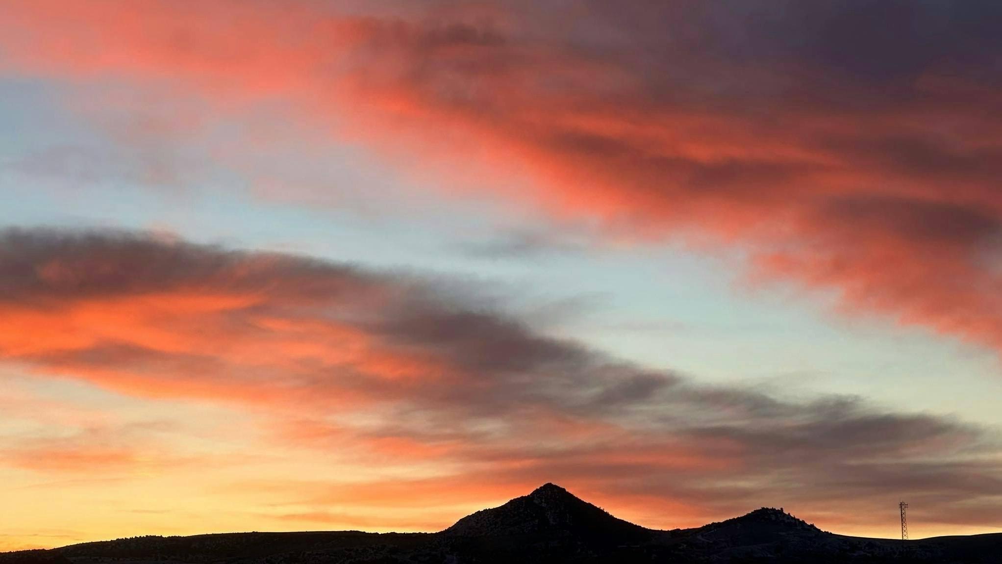 "Beautiful sunrise from my little town of Thermopolis. Have a wonderful day!"