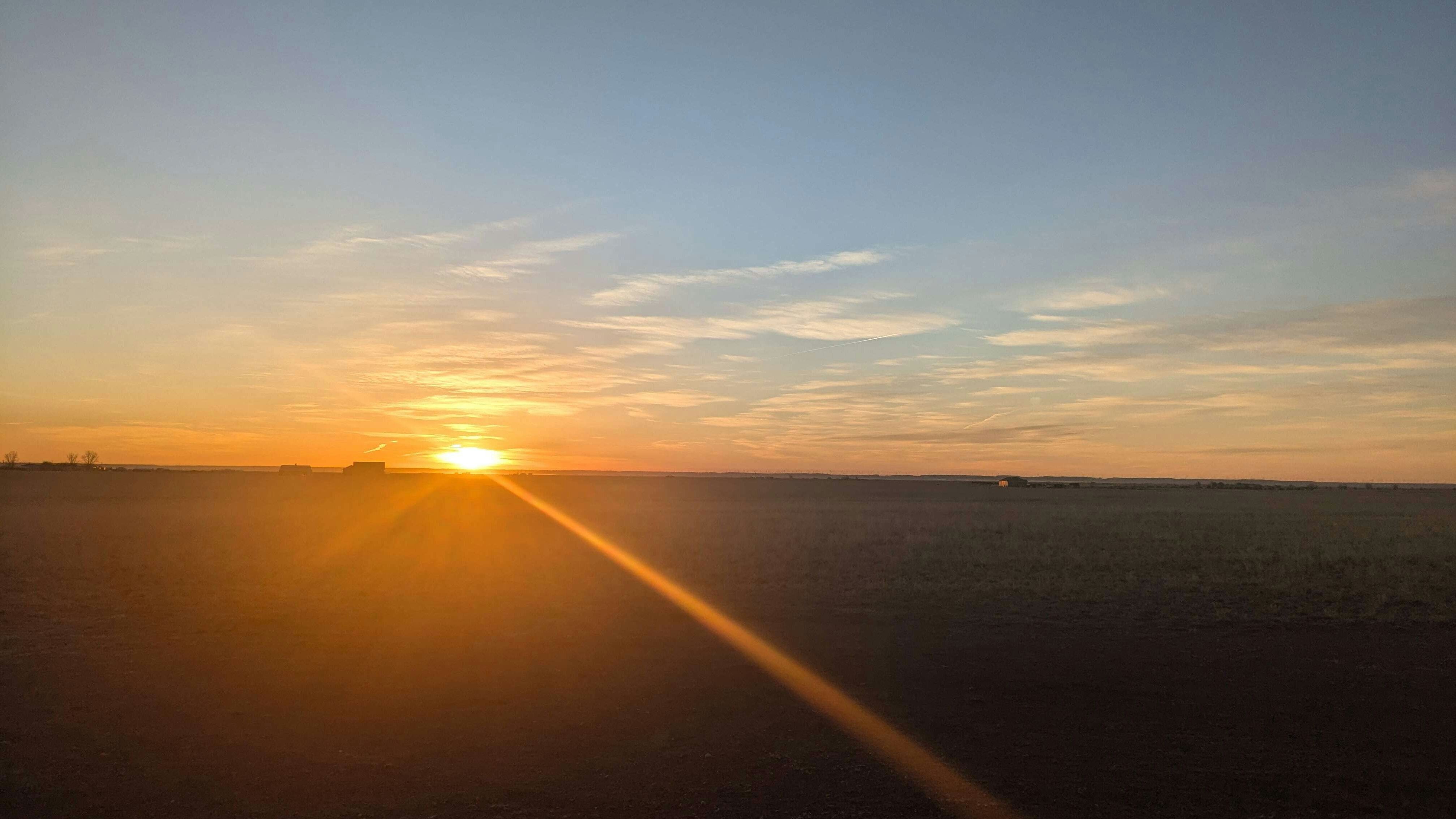 "The soft hues of orange and blue blended seamlessly, a perfect reflection of the calm and vastness that define life out here. It's moments like this that remind us of the simple, profound beauty in the everyday." Carpenter, WY
