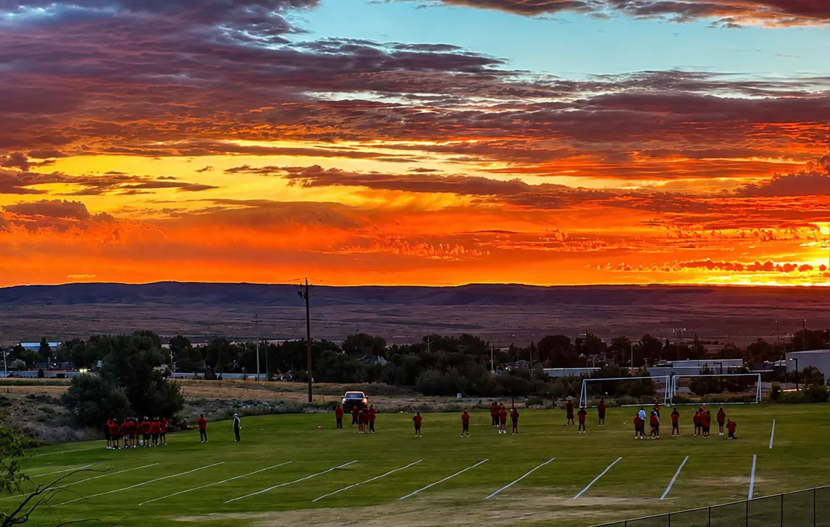 "Rawlins Outlaws football team 6am practice for the boys of fall."