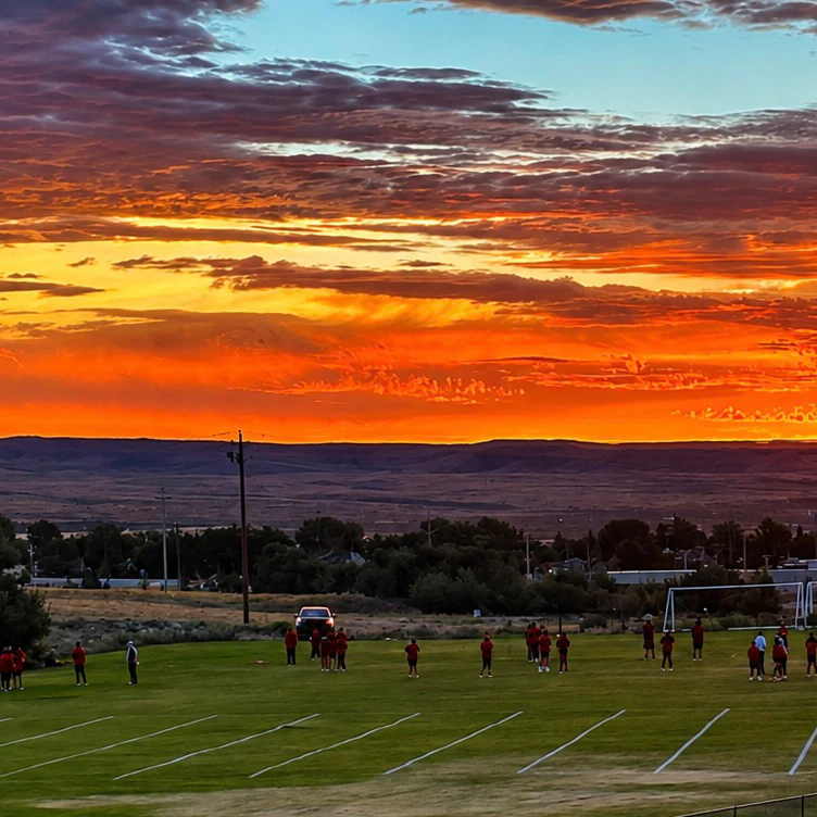 "Rawlins Outlaws football team 6am practice for the boys of fall."