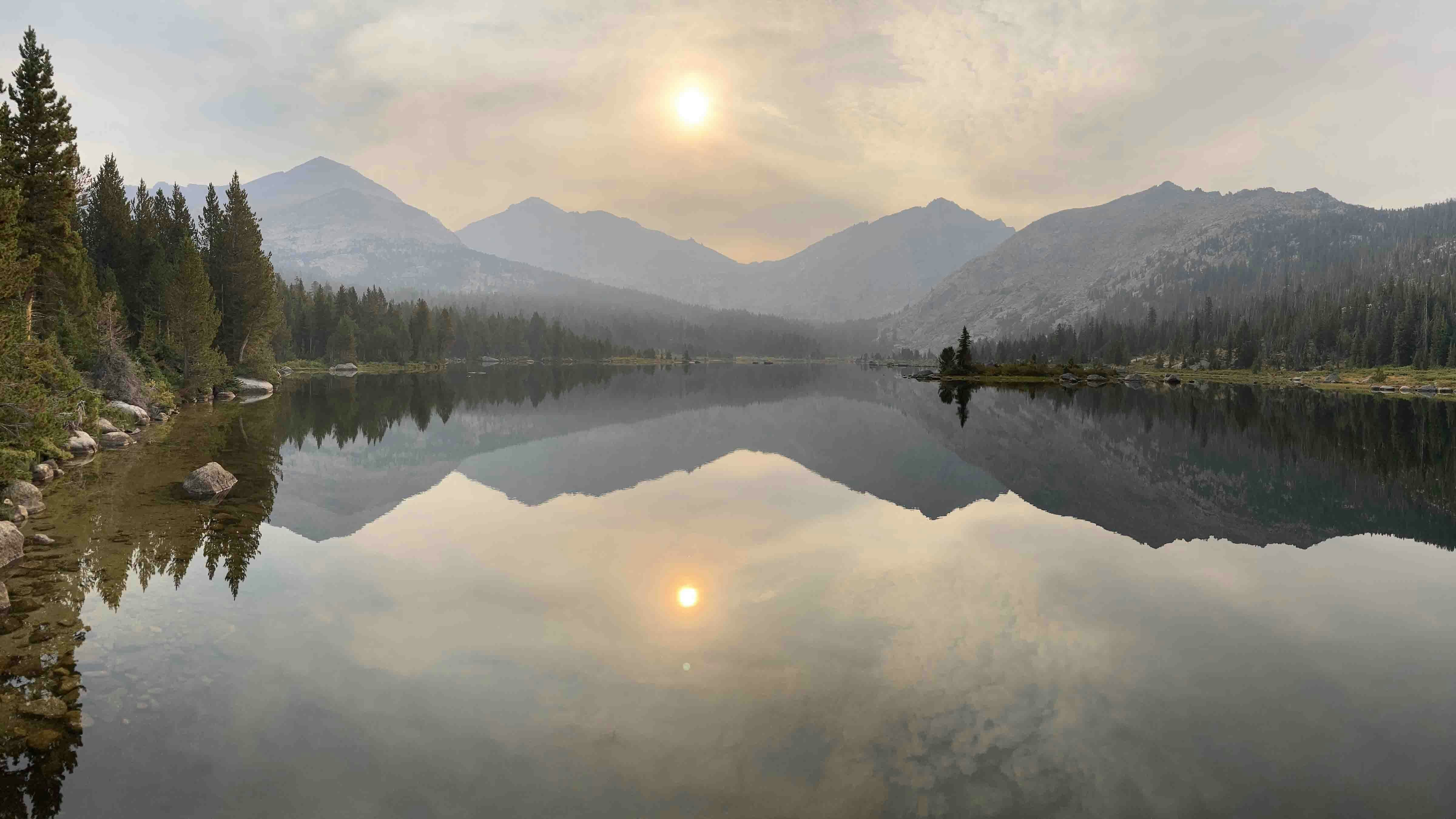 Sunrise over Donald Lake in the Wind River Mountains. Smoke courtesy of Upper Green River fire.