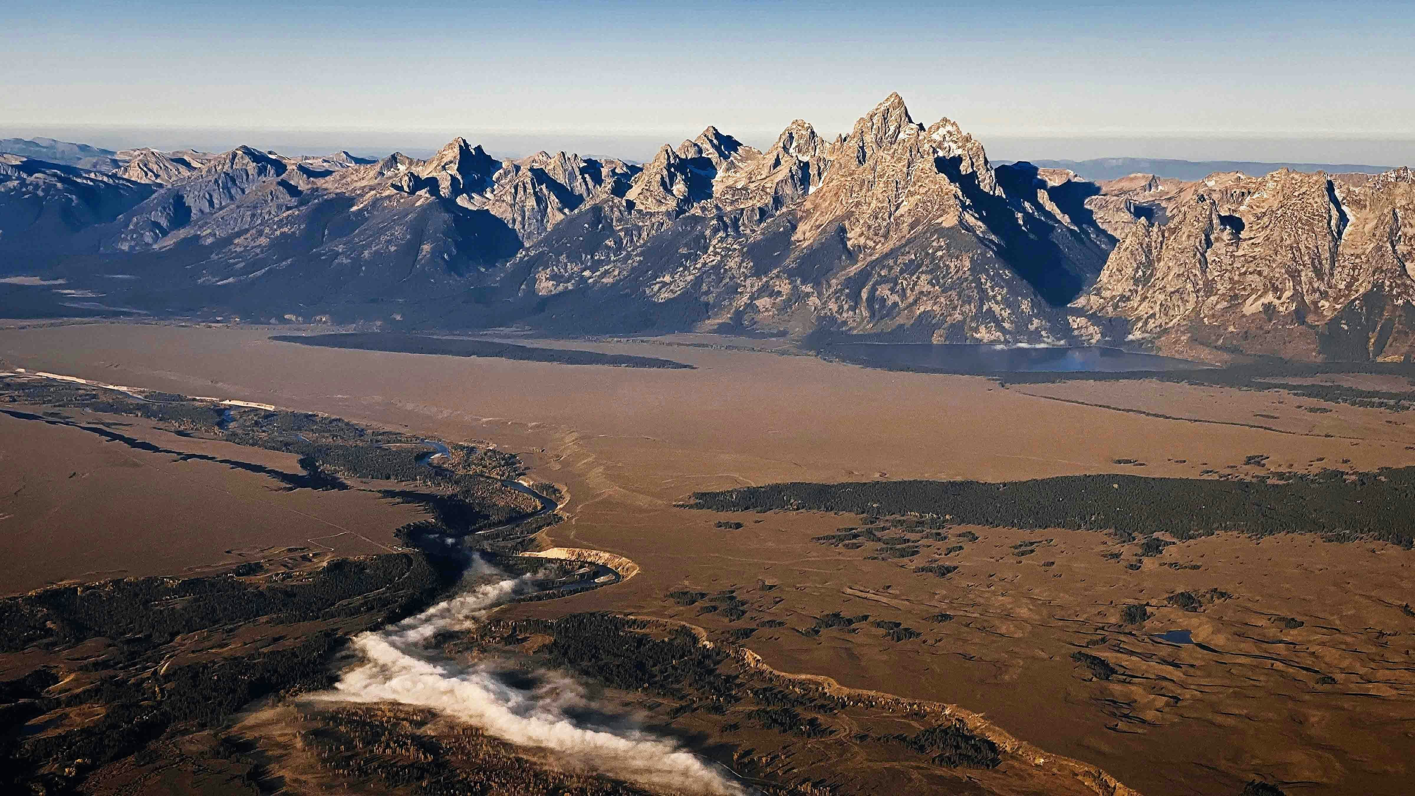 “Crisp September air forms a morning mist over the Snake River in Teton County, two thousand feet above Ansel Adams' well-worn tripod divots.”