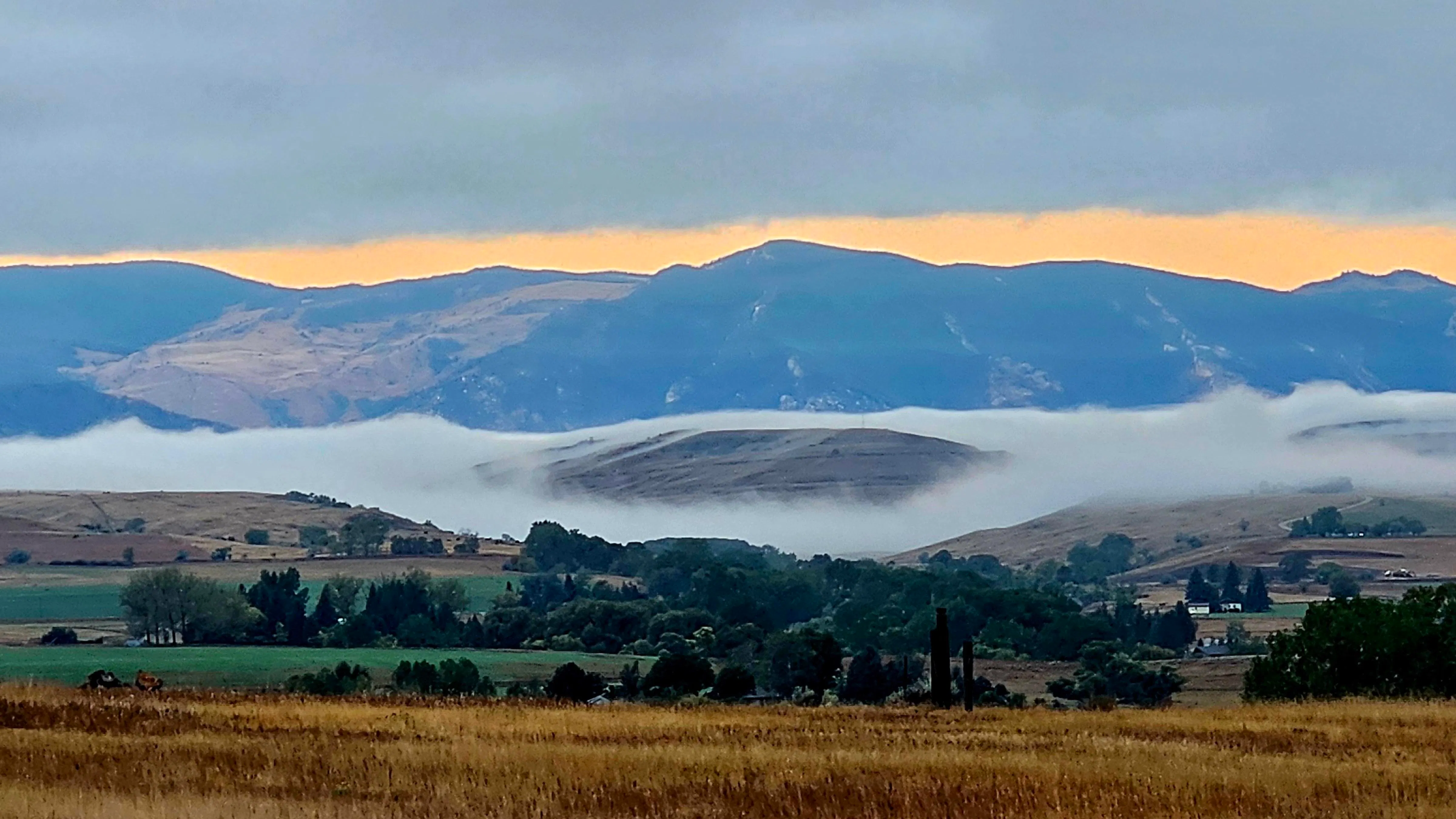 "Sunrise on the mountain face."