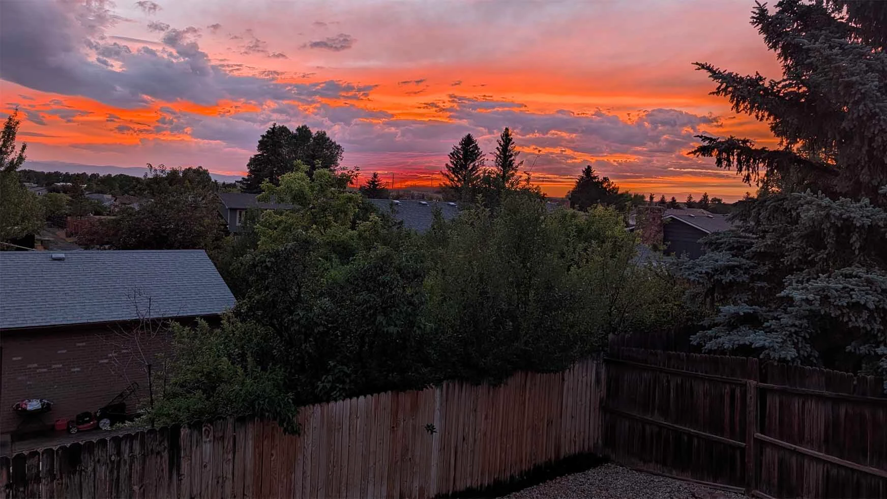 This was the sunset tonight in Laradise from from my backyard after two days of spectacular lightening, deafening thunder claps, and some some glorious, and much needed, rain.