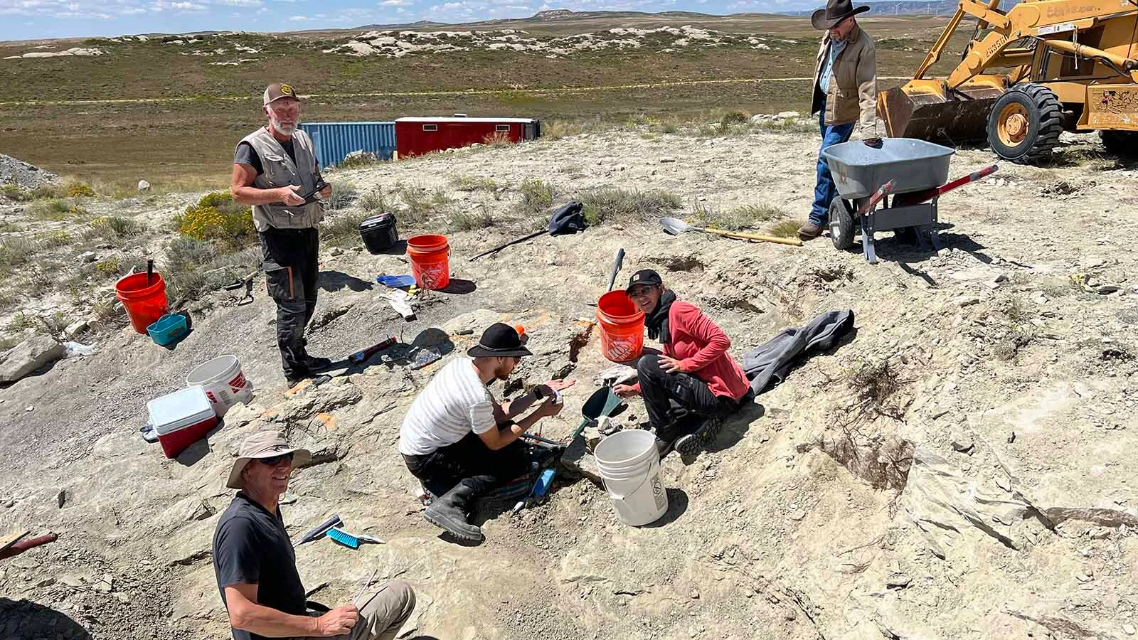Paleontologists with the Sauriermuseum Aathal excavating in the Meilyn Quarry near Medicine Bow. Since 2018, the Swiss museum has found incredibly well-preserved fossils including two juvenile Camarasaurus, a juvenile Allosaurus, and a Stegosaurus. 