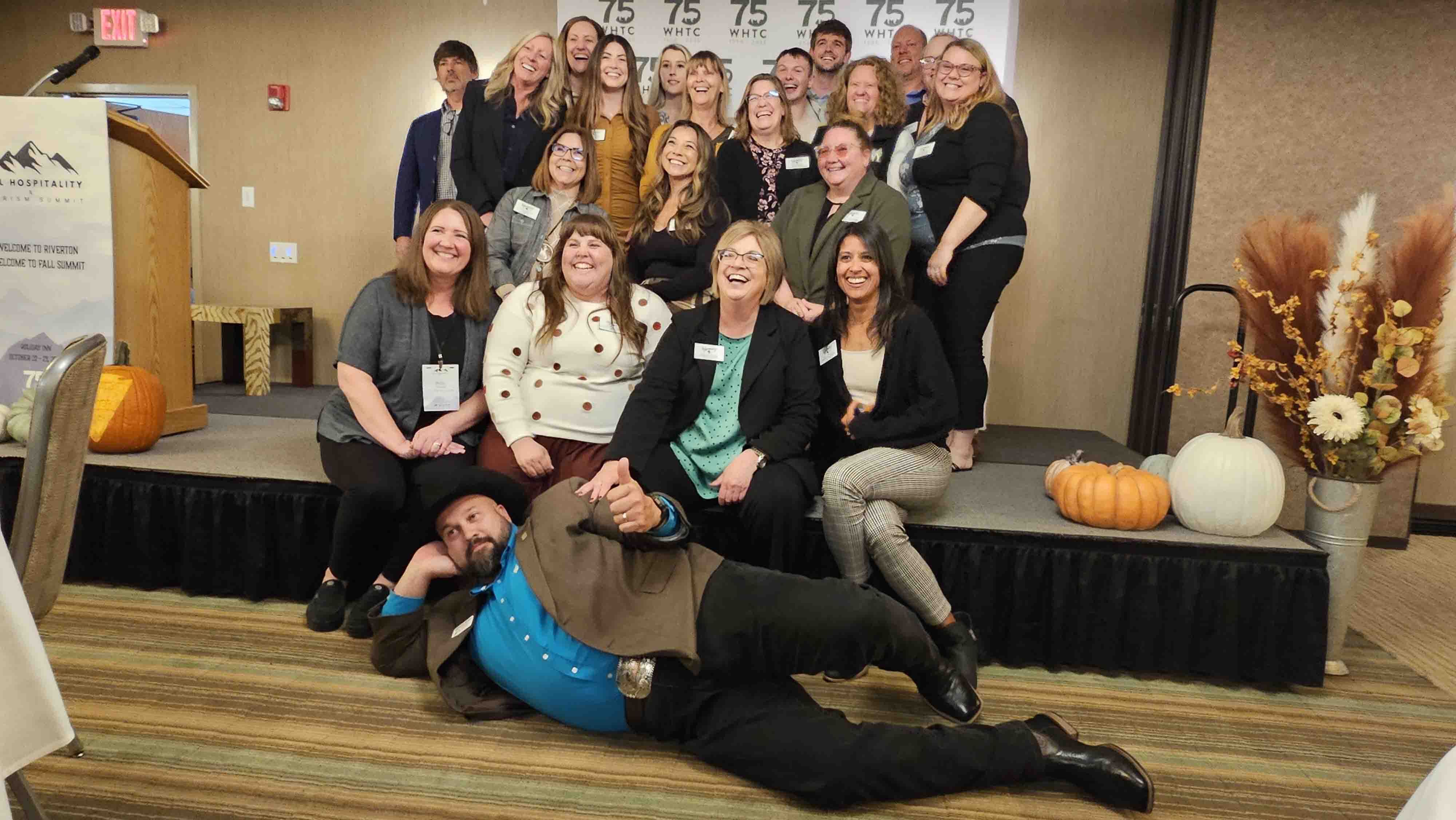 Incoming Wyoming Office of Tourism Director Domenic Bravo strikes a pose in a fun photo taken with outgoing director Diane Shober and the Wyoming Office of Tourism staff, just after the awards ceremony for the Fall Hospitality and Tourism Summit in Riverton.