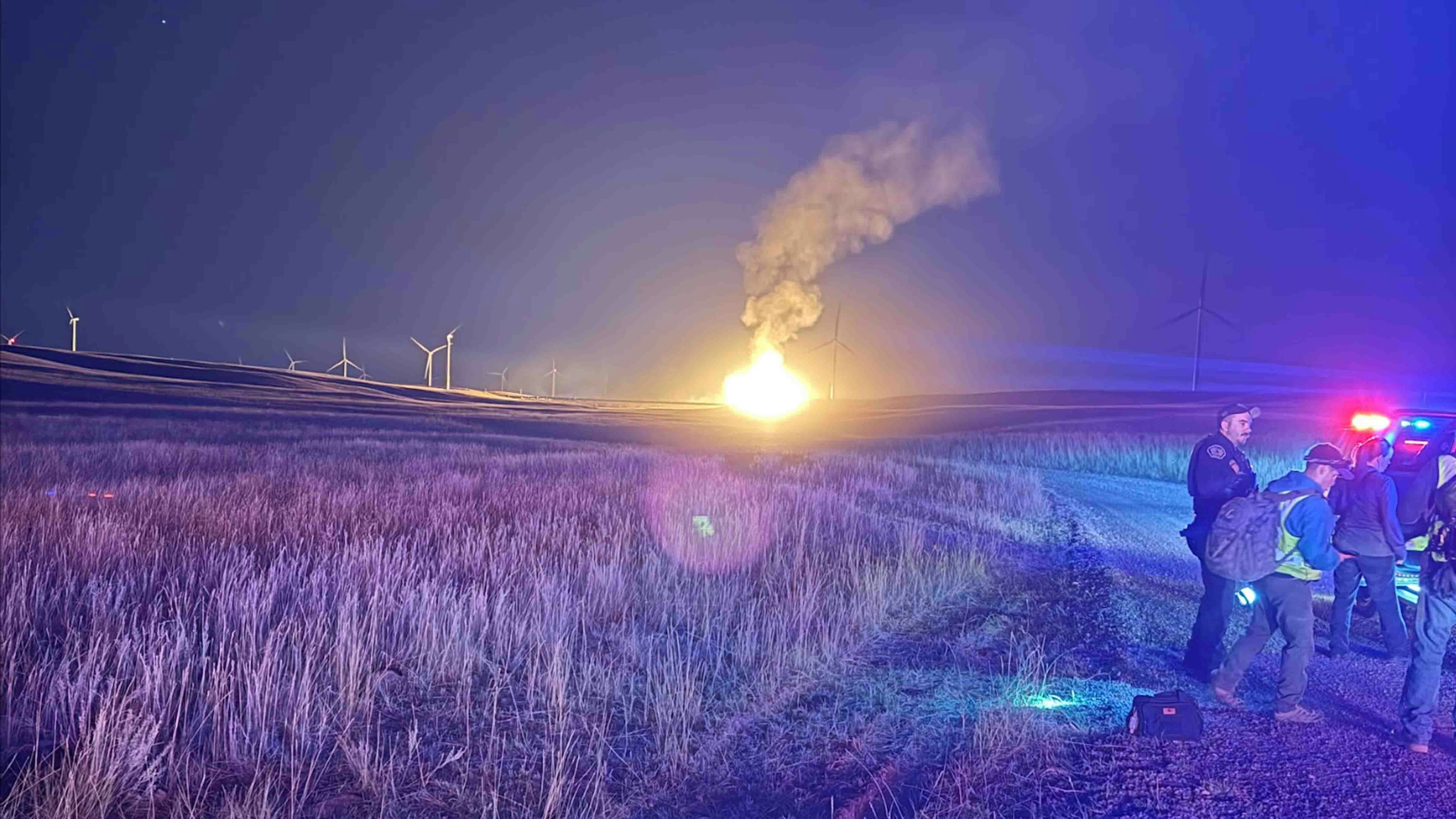 The ominous glow of flames from an explosive train derailment about 1 a.m. Sunday, Sept. 21, 2025, could be seen for at least 60 miles, including places in Colorado. The derailment involved hazardous materials and ruptured a natural gas line.