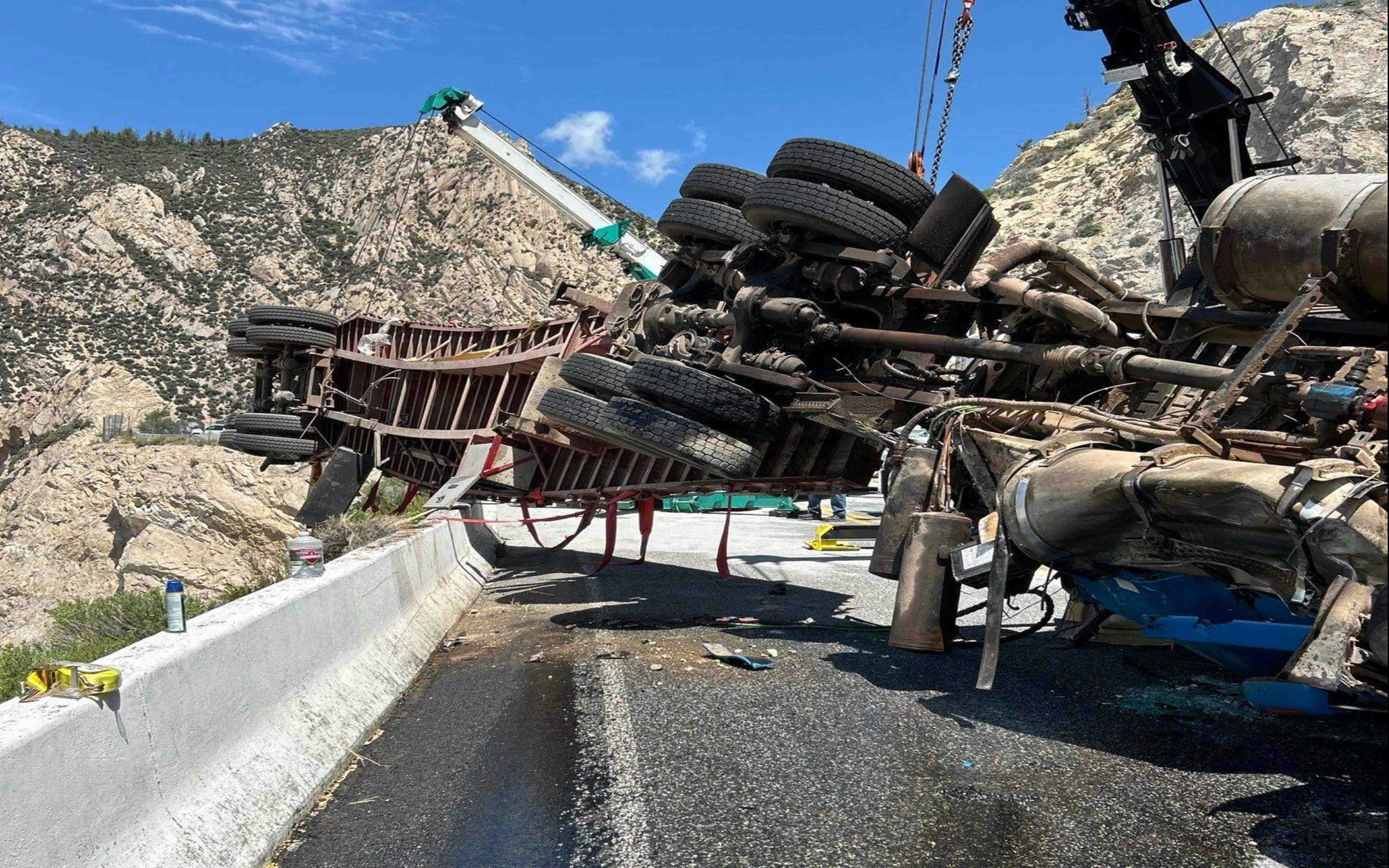 It took a Montana company three heavy-duty wrecker trucks hours to recover a semitrailer hanging over a cliff on Wyoming Highway 14A on Tuesday. The driver wasn’t hurt, but it took much more than a regular tow truck to pull the semitrailer back over the highway barrier.