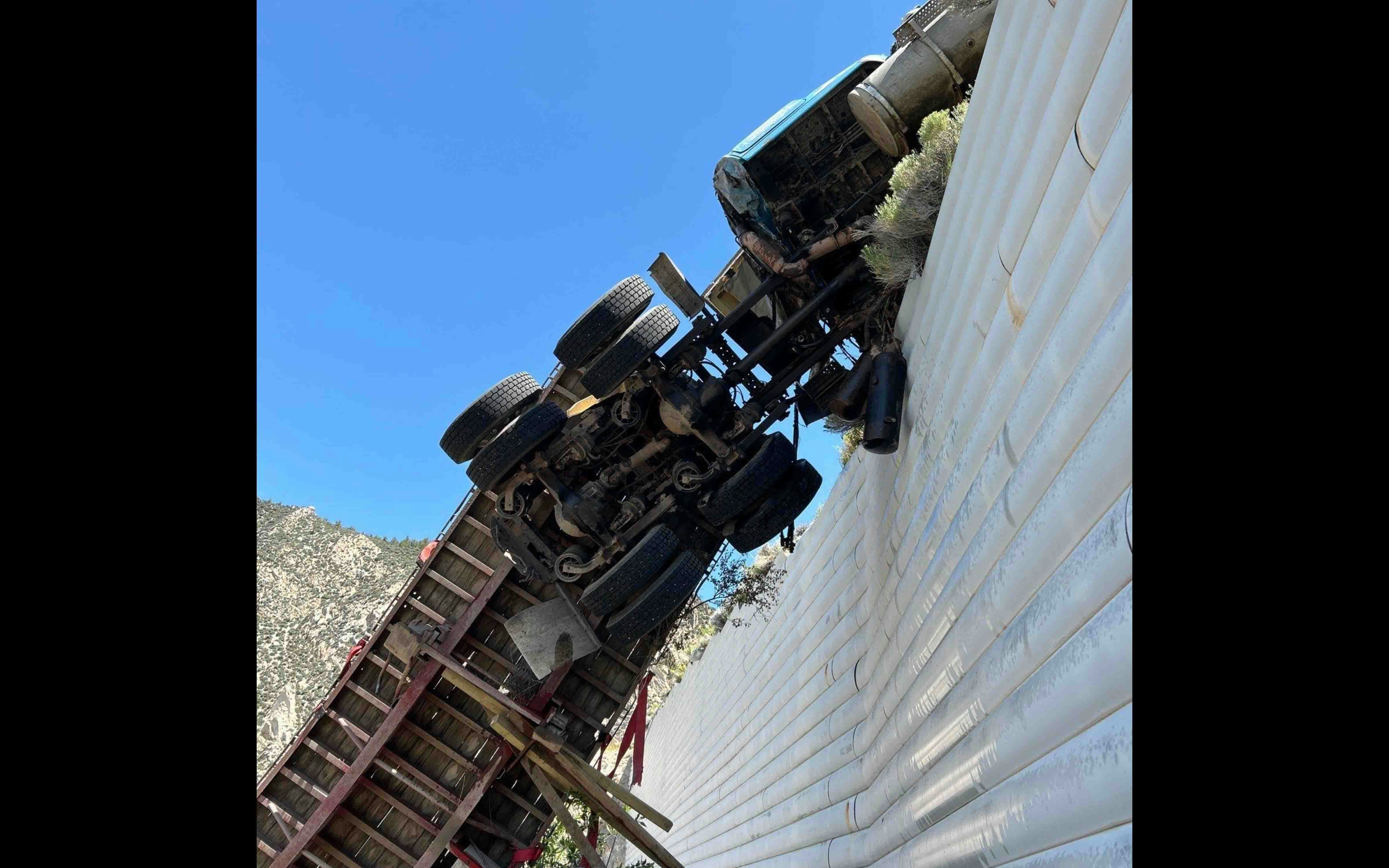 It took a Montana company three heavy-duty wrecker trucks hours to recover a semitrailer hanging over a cliff on Wyoming Highway 14A on Tuesday. The driver wasn’t hurt, but it took much more than a regular tow truck to pull the semitrailer back over the highway barrier.