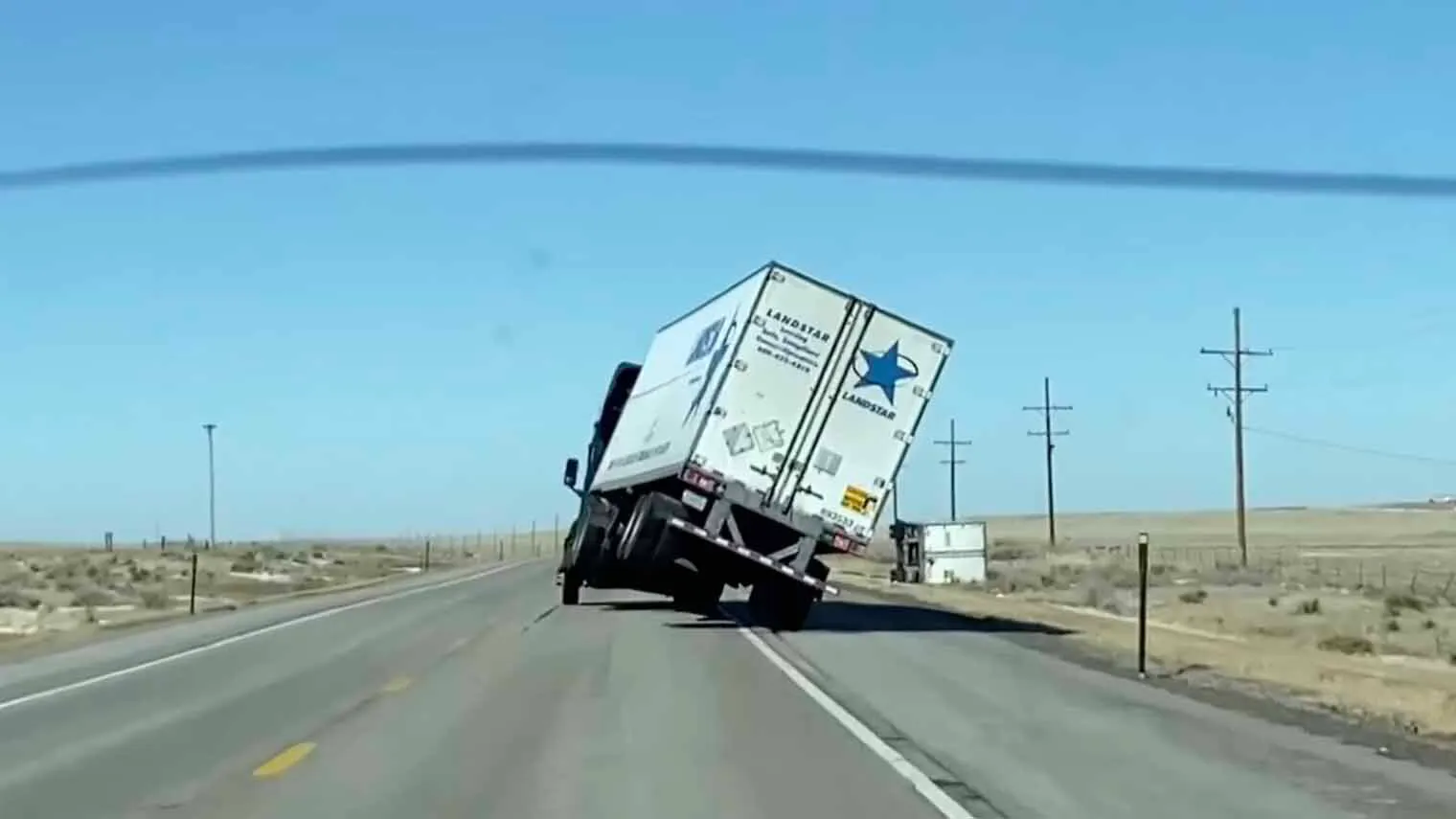 Truck blow over Highway 85