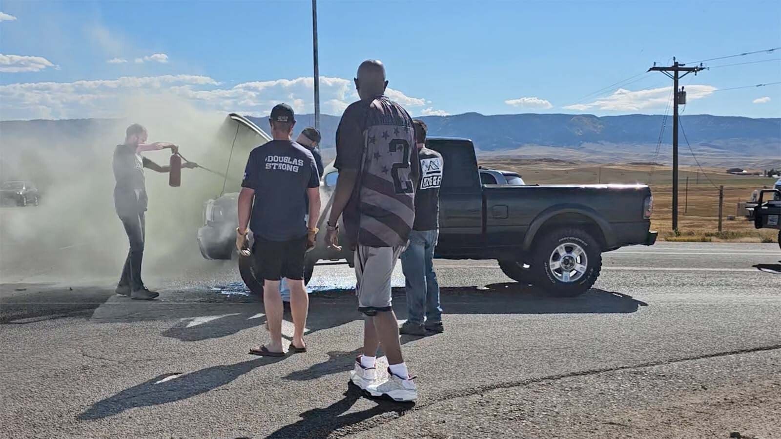 A host of people stopped to help Nathan Frederick when his truck caught on fire off I-25 near Casper on Sunday, Spet. 29, 2024. (Video by Renee Jean, Cowboy State Daily)