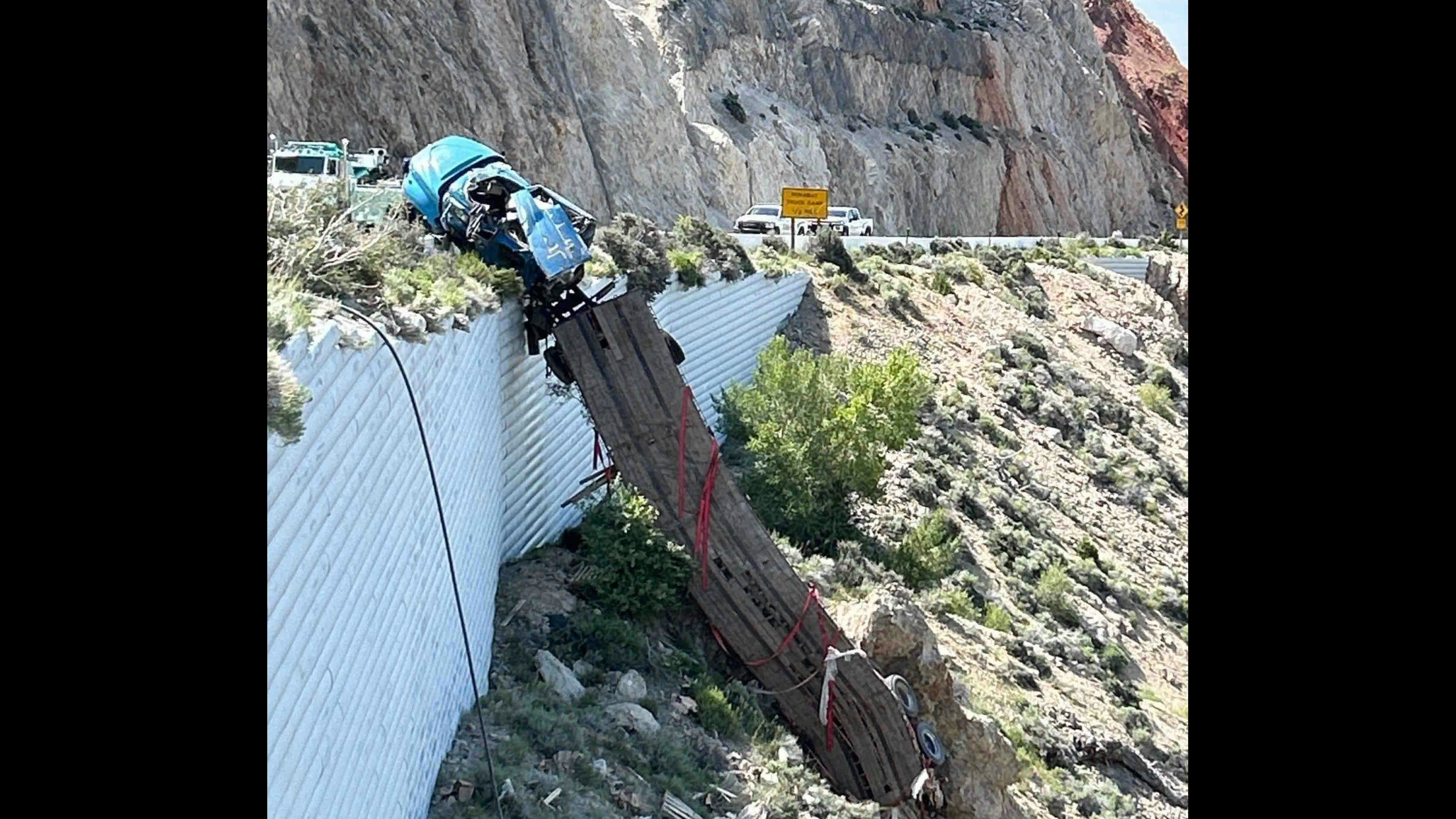 It took a Montana company three heavy-duty wrecker trucks hours to recover a semitrailer hanging over a cliff on Wyoming Highway 14A on Tuesday. The driver wasn’t hurt, but it took much more than a regular tow truck to pull the semitrailer back over the highway barrier.