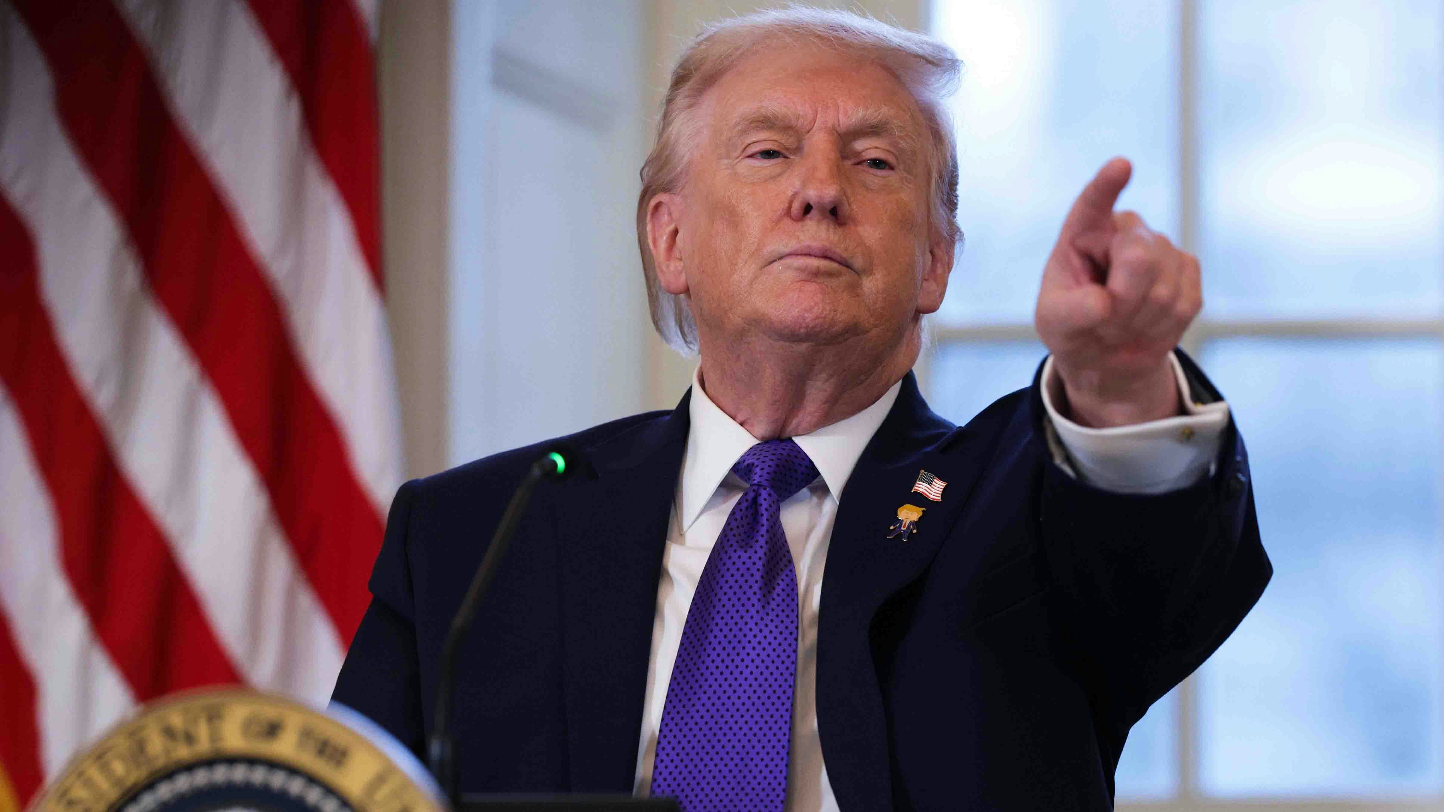 U.S. President Donald Trump takes questions from members of the media during a meeting with oil and gas executives in the East Room of the White House on January 9, 2026