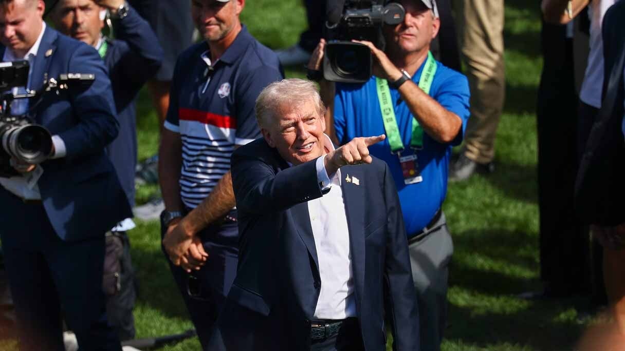 President Donald Trump acknowledges the crowd during the Friday afternoon 2025 Ryder Cup at Black Course at Bethpage State Park Golf Course on September 26, 2025 in Farmingdale, New York.