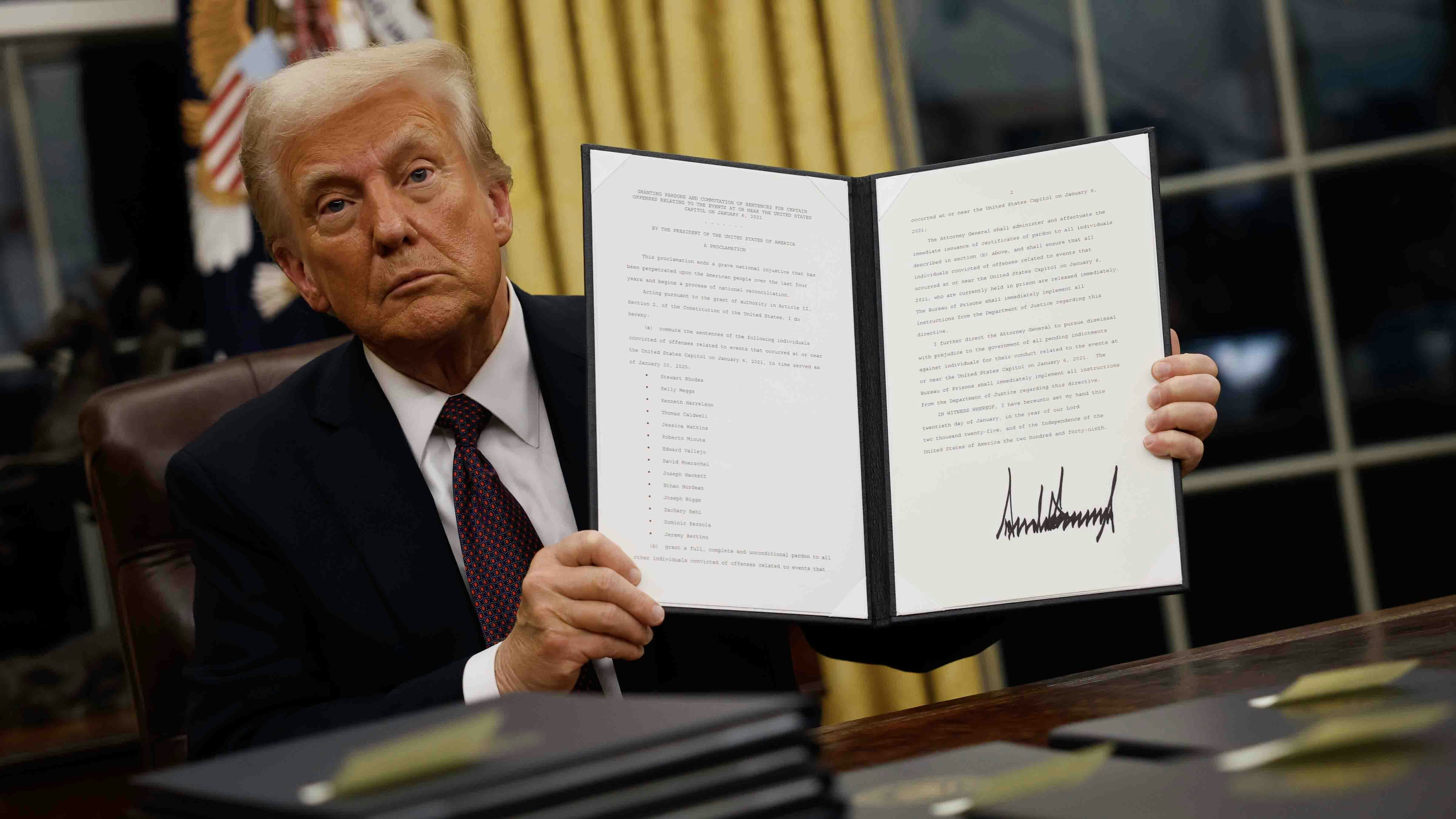President Donald Trump signs executive orders in the Oval Office on January 20, 2025 in Washington, DC. Trump takes office for his second term as the 47th president of the United States.