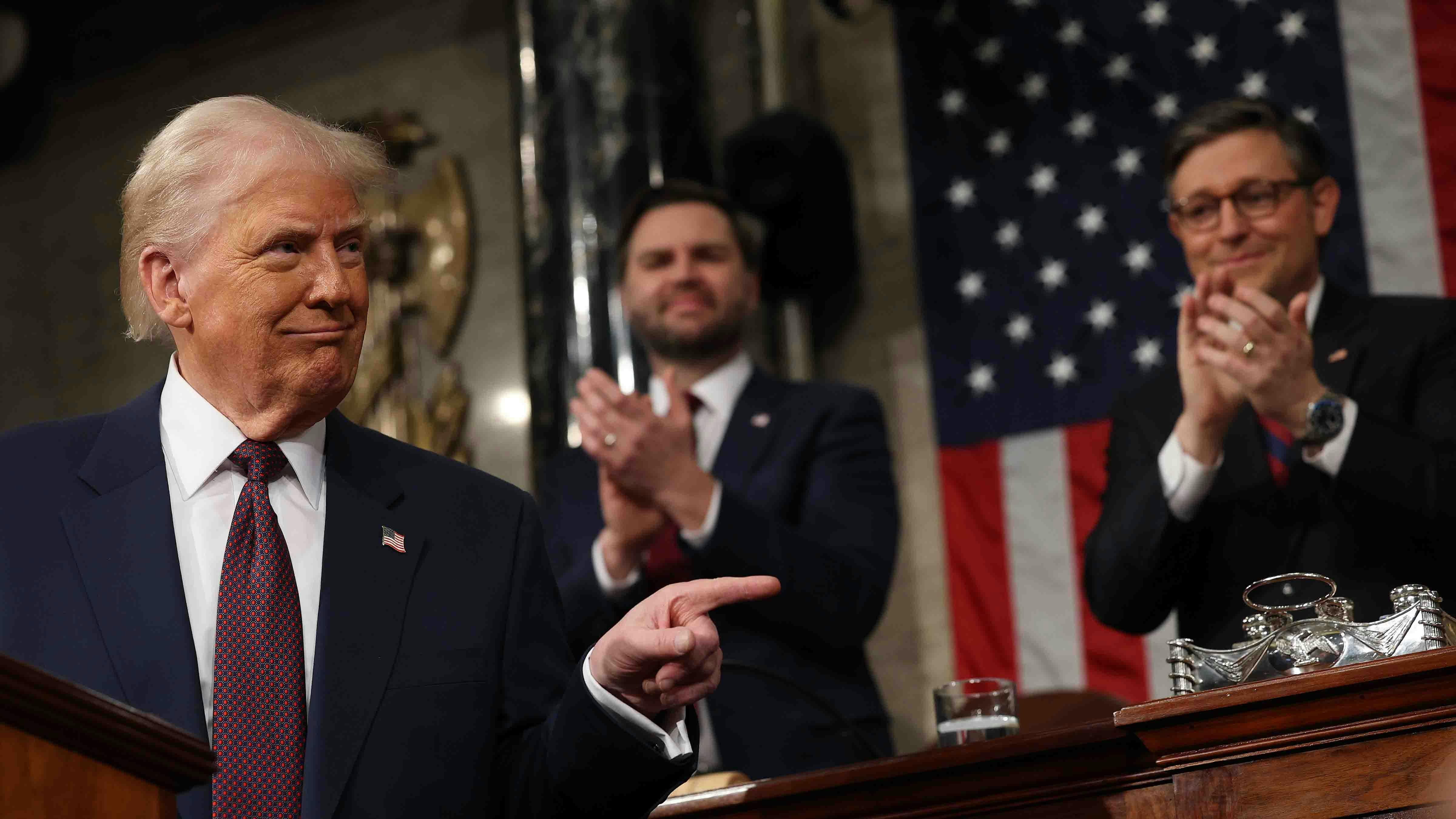 U.S. Vice President JD Vance and Speaker of the House Mike Johnson (R-LA) applaud as U.S. President Donald Trump addresses a joint session of Congress at the U.S. Capitol on March 04, 2025 in Washington, DC.