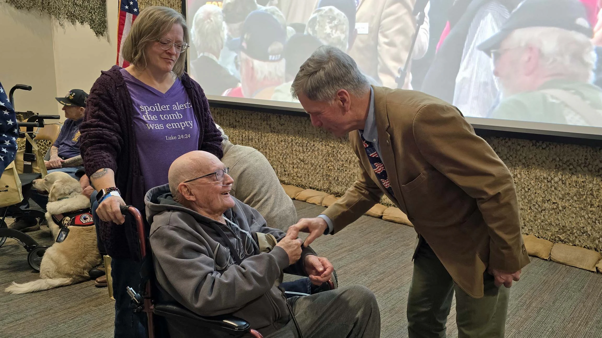 Gov. Mark Gordon shakes hands with a veteran in the receiving line during Wyoming's Welcome Home Day at the National Museum of Military Vehicles.