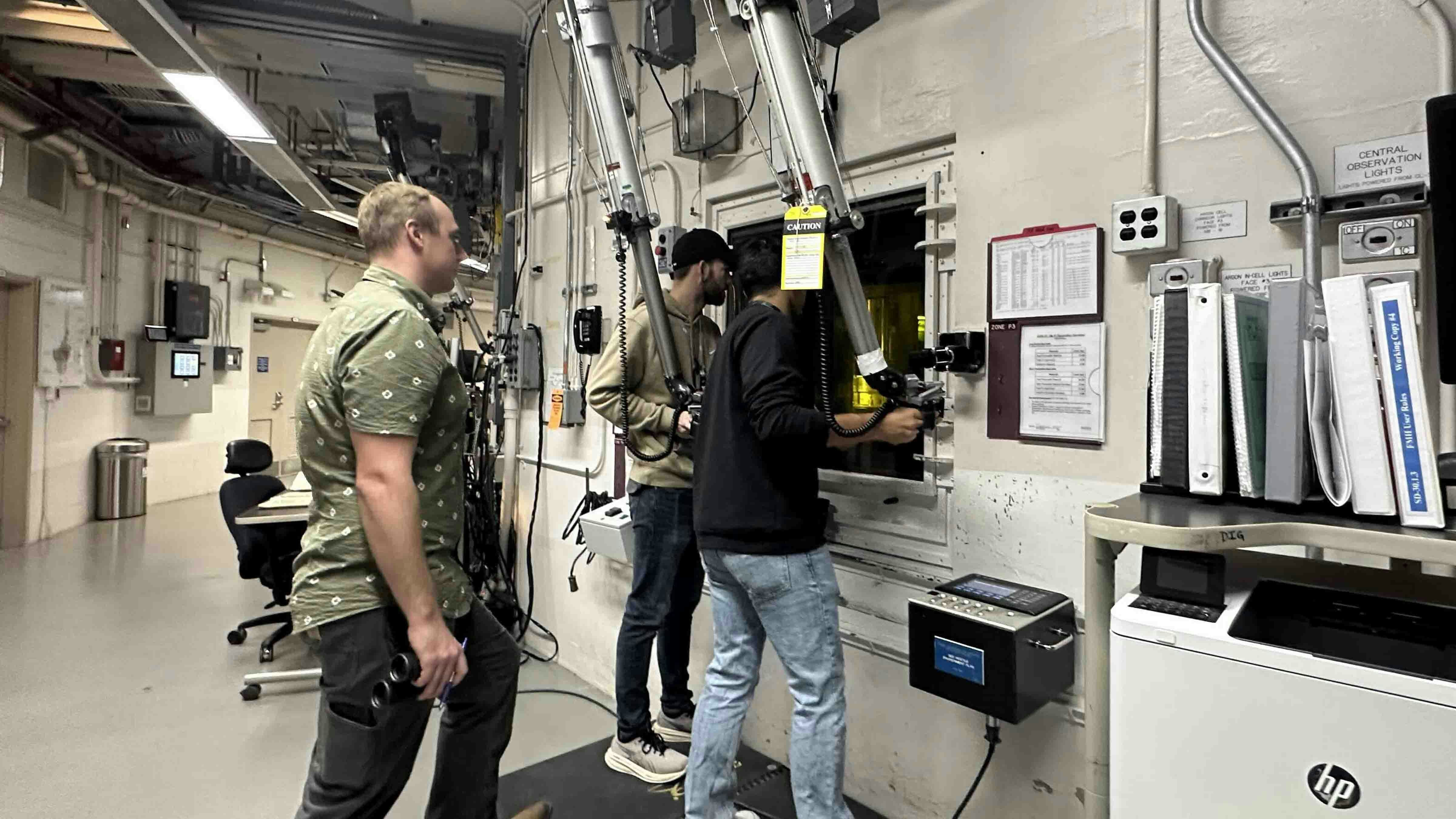 U.S. Energy Secretary Chris Wright took the controls of a robotic arm operating behind five feet of protective glass. He was at the controls of a high-tech version of an arcade mechanical claw machine. Instead of snatching stuffed animals and other prizes, this mechanical arm is designed to grip highly radioactive spent nuclear fuel.